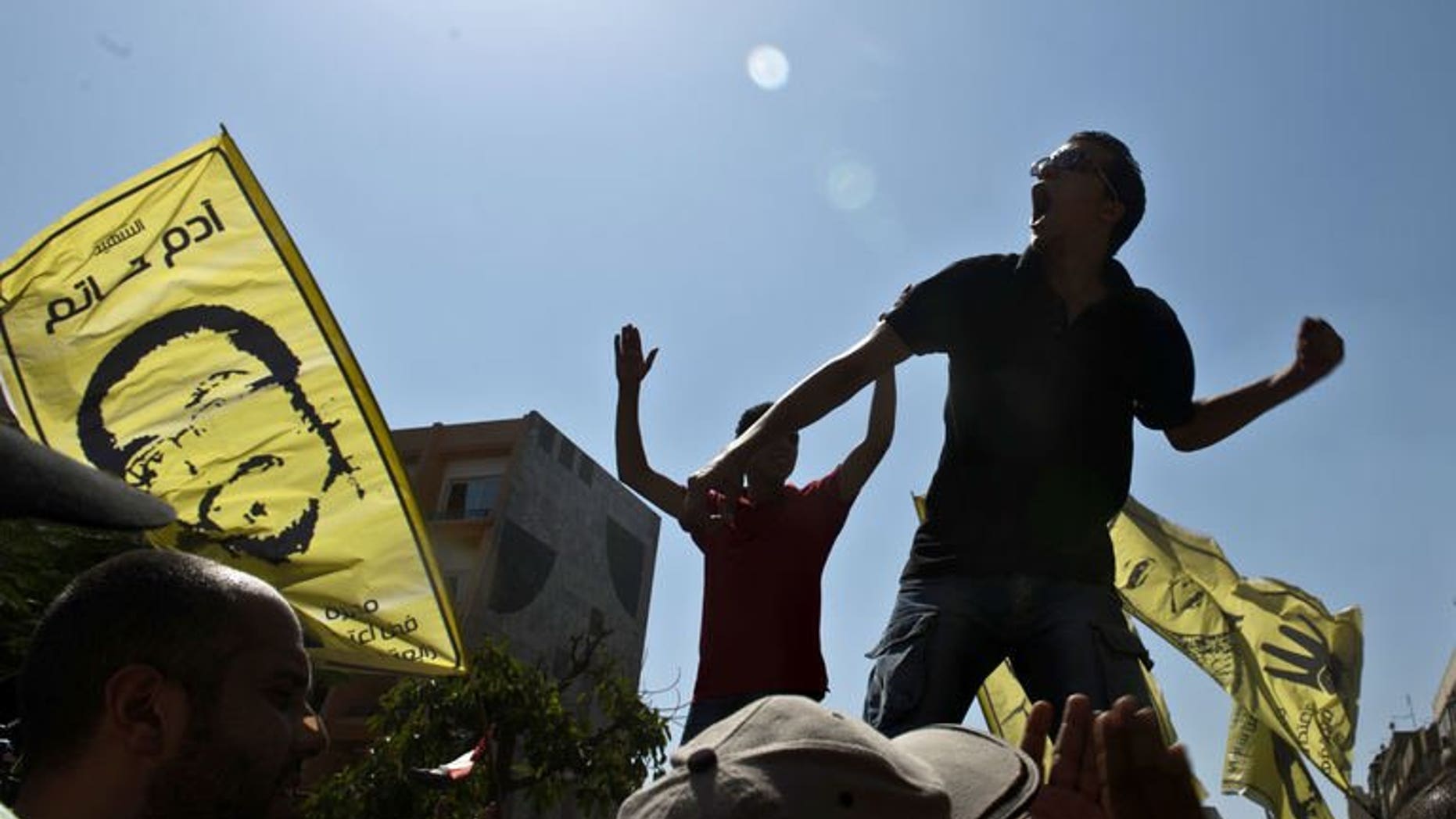 Supporters of ousted Egyptian president Mohamed Morsi shout slogans during a demonstration against the military backed government on September 13, 2013 in the Egyptian capital, Cairo.