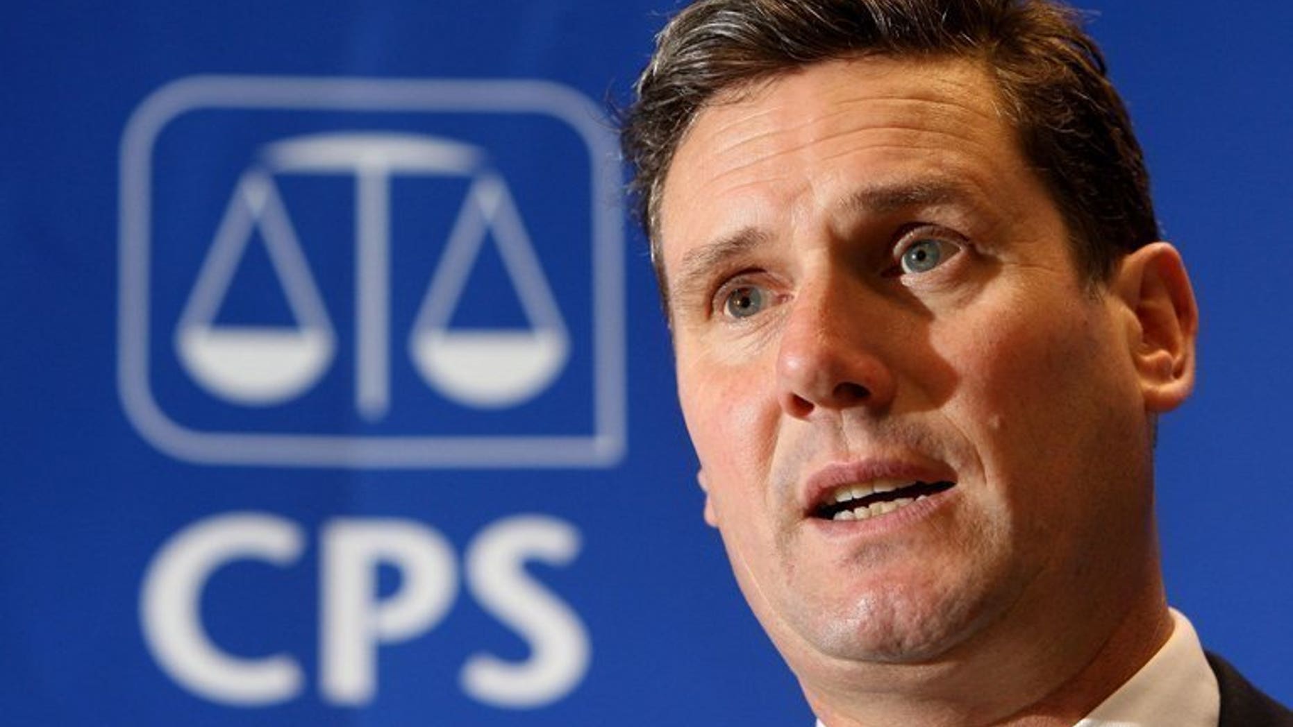 File picture shows Britain's director of public prosecutions (DPP), Keir Starmer speaking during a press conference at the Crown Prosecution Service in London, on September 23, 2009. People who cheat the benefits system in England and Wales will face increased prison sentences of up to 10 years under new guidelines published by Starmer on Monday.