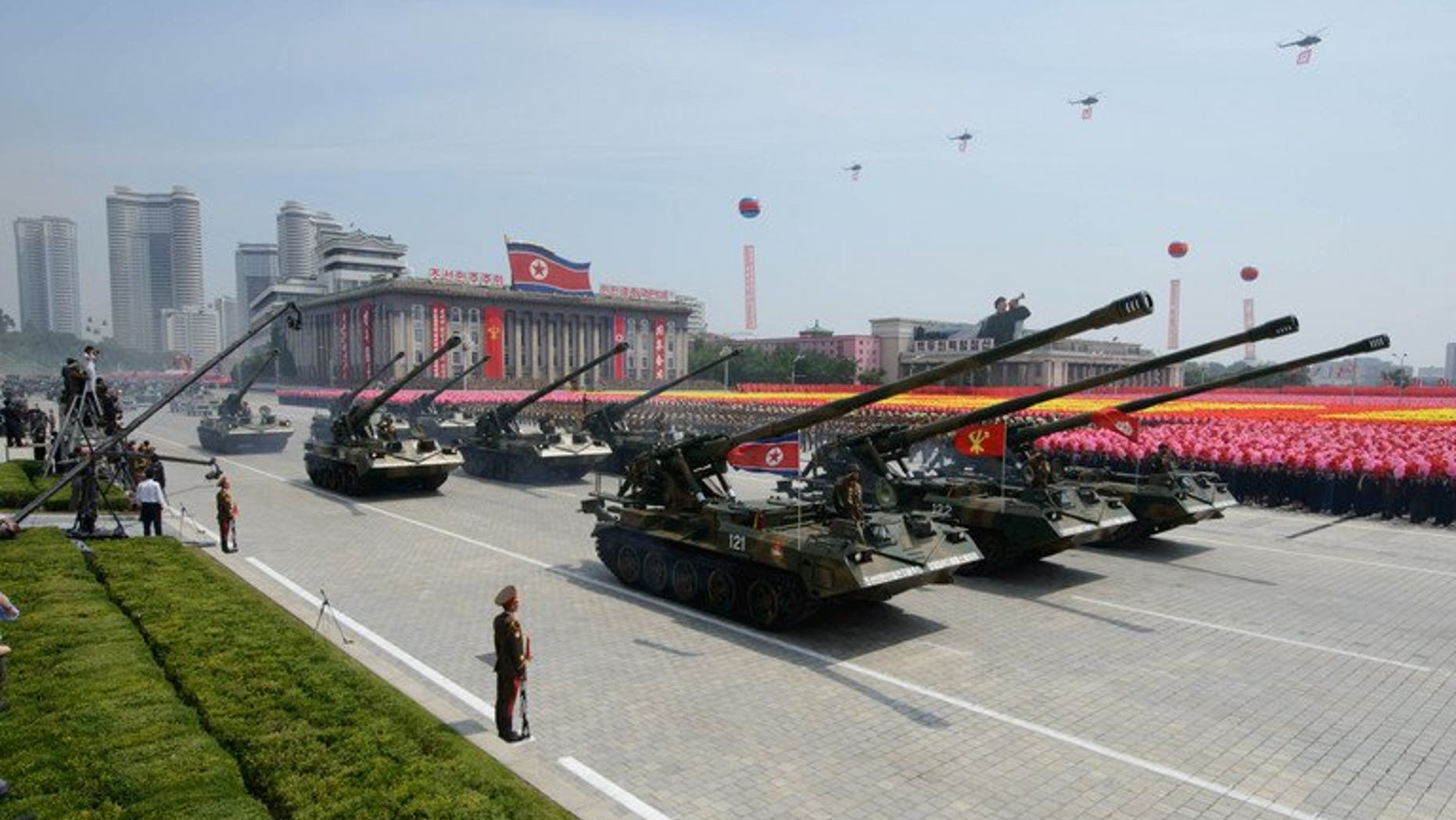 A North Korean military parade in Pyongyang on July 27, 2013. The teenage daughter of a senior North Korean security official has escaped to the South in a rare defection.