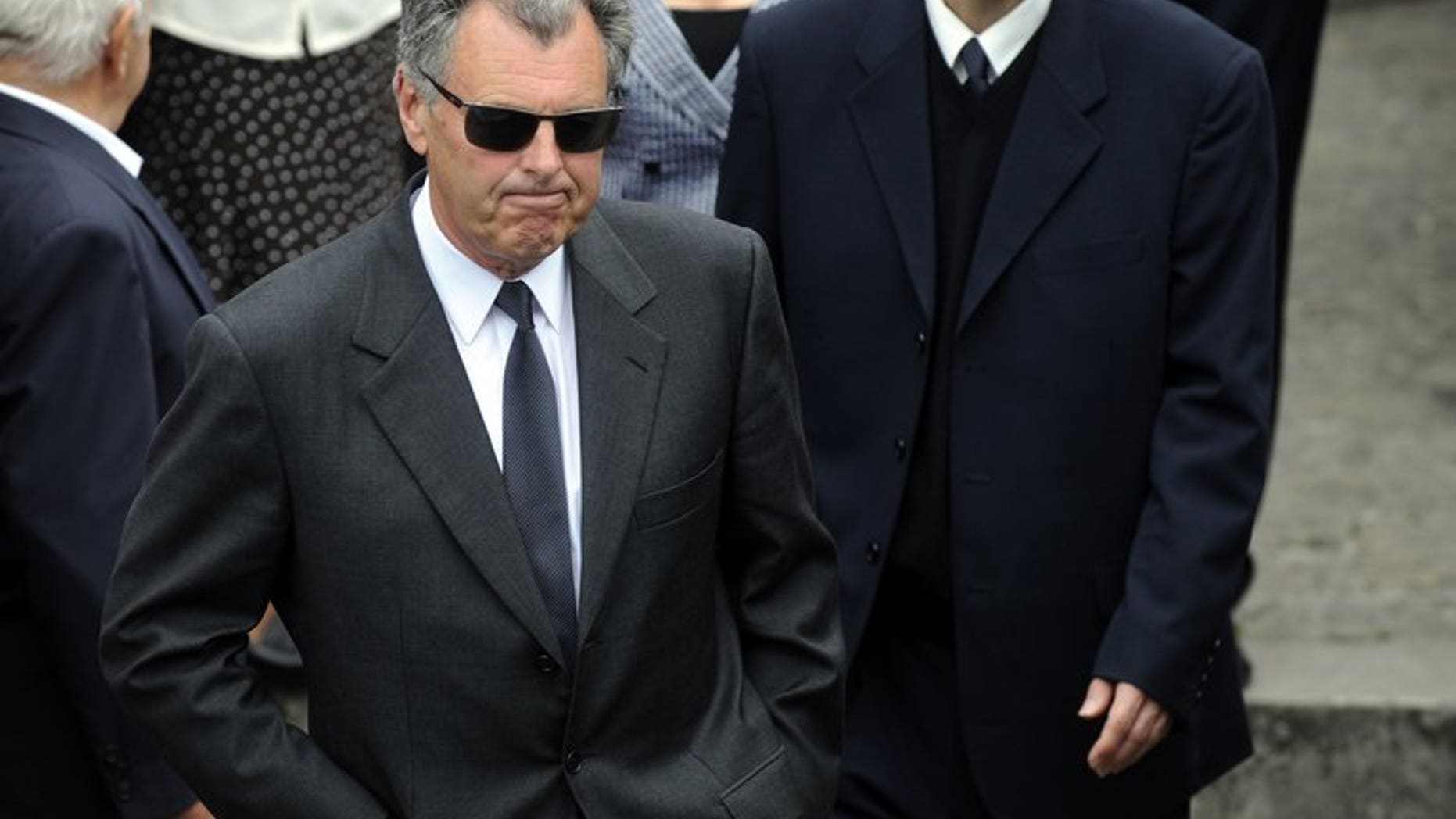 Scottish golfer Bernard Gallacher (C) attends the funeral of Spanish golf legend Severiano Ballesteros in Pedrena, Spain on May 11, 2011.