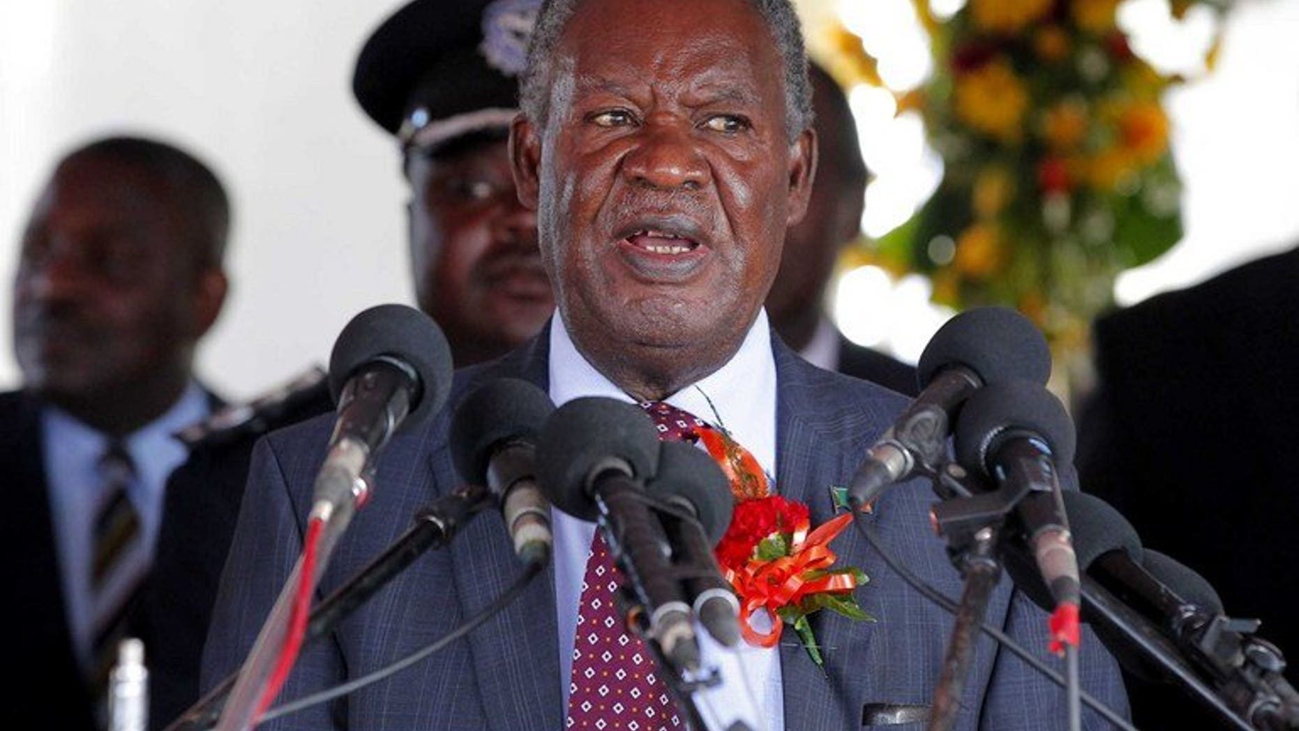 Zambian President Michael Sata speaks in Victoria Falls on May 29, 2012. Sata threatened to dissolve parliament and prompt fresh elections, accusing ministers of failing to defend his government from opposition attacks.