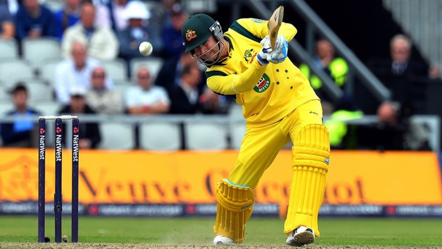 Australia captain Michael Clarke bats in the second one day international (ODI) cricket match against England at Old Trafford in Manchester, on September 8, 2013. Clarke won the toss and elected to bat against England in the fifth and final day/night ODI in Southampton on Monday.