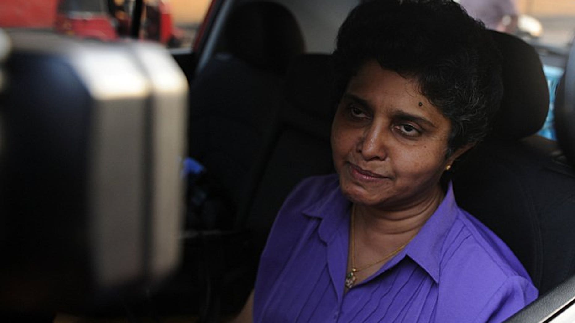 Sri Lanka's former chief justice Shirani Bandaranayake leaves her official residence in Colombo, on January 15, 2013. Sri Lanka has brought criminal charges of corruption against Bandaranayake whose sacking earlier this year was internationally criticised as a blow to judicial independence.