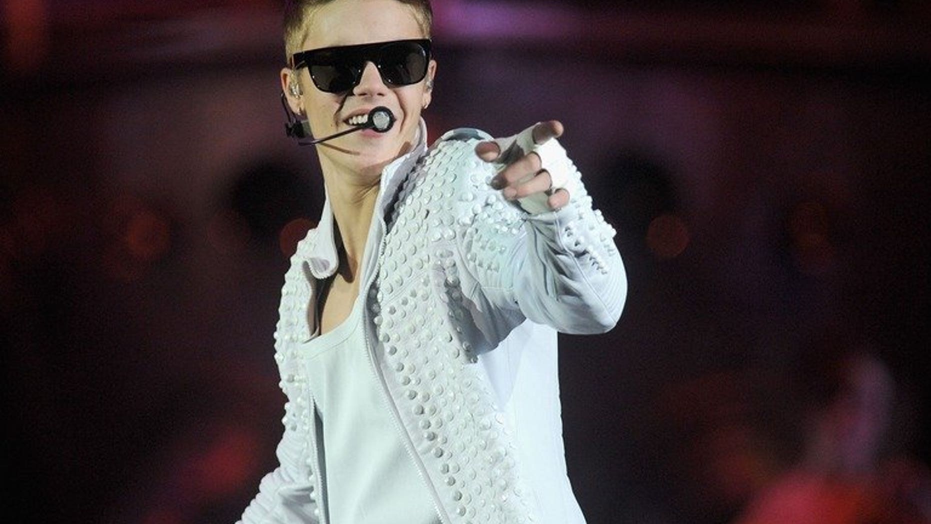 Justin Bieber, pictured during a performance on August 2, 2013 in New York, could upstage even the likes of Fernando Alonso and Lewis Hamilton at this weekend's Formula One Singapore Grand Prix, organisers said Wednesday.