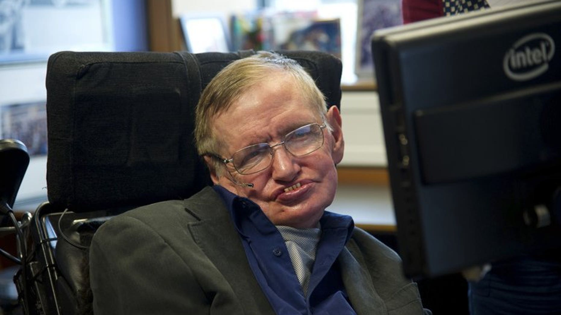 Physicist Stephen Hawking sits at his desk in the Applied Mathematics Department of Cambridge University on August 30, 2012. Hawking, the theoretical physicist who suffers from motor neurone disease, has publicly backed the notion of assisted suicide for people with terminal illnesses.