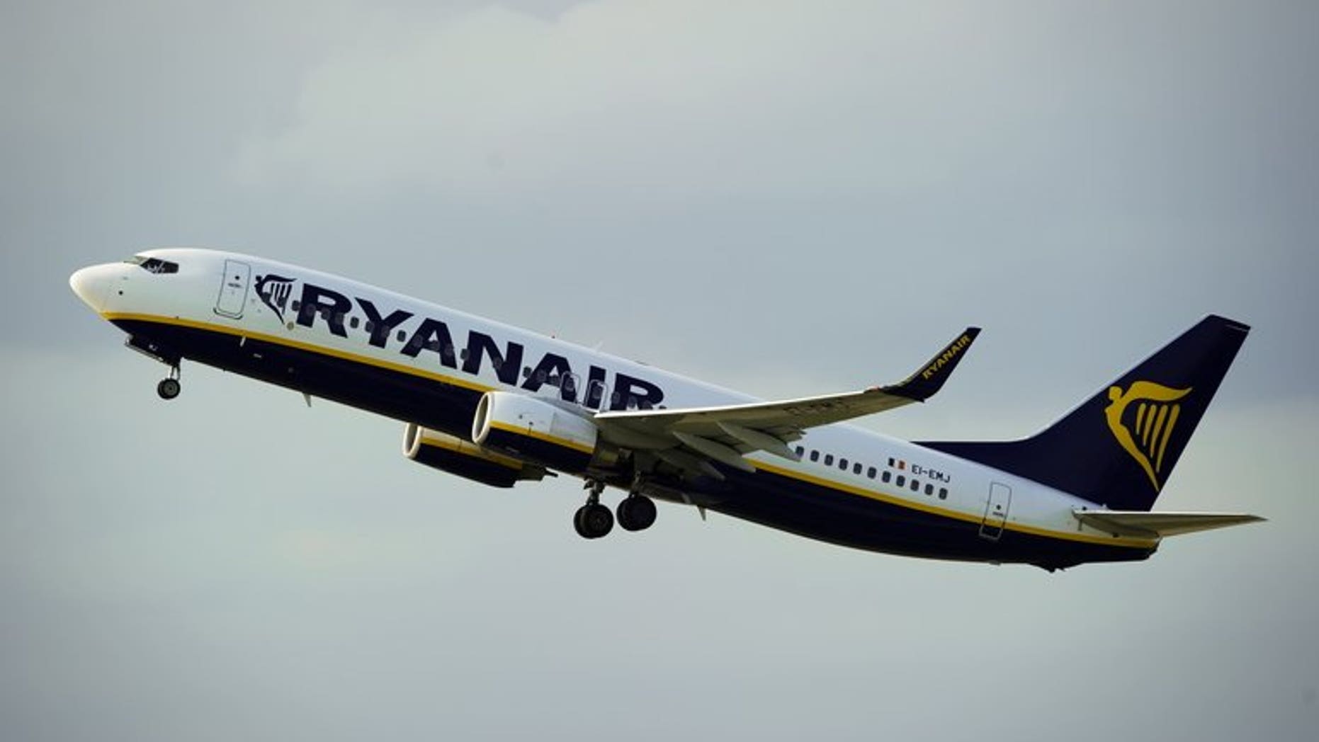 A Ryanair Boeing 737 takes off from Barcelona's airport on September 01, 2010. A group of drunk, dancing Scottish passengers caused such a commotion on a Ryanair flight from Glasgow to Ibiza that they forced the plane to make an emergency landing near Paris.