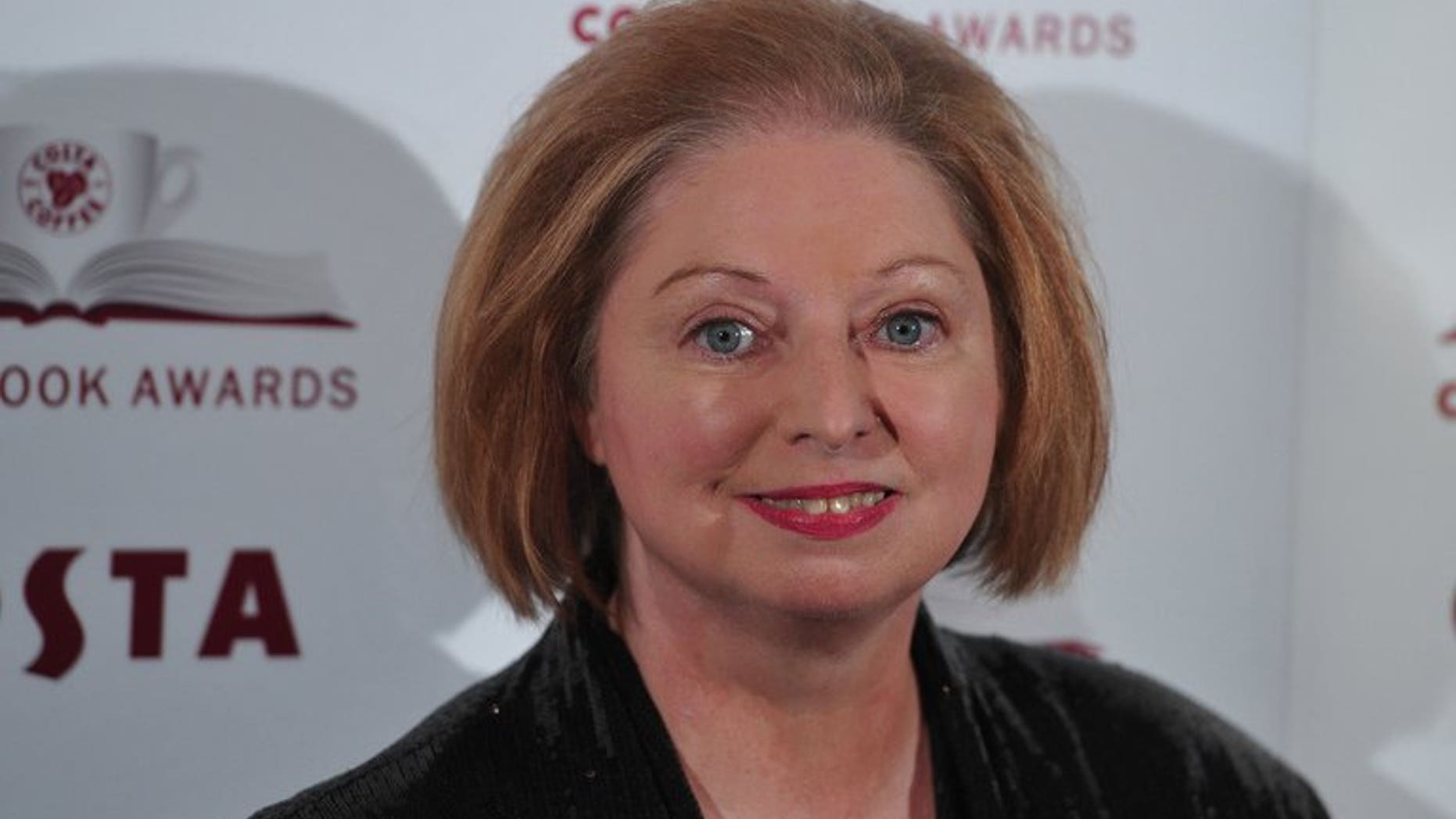 Author Hilary Mantel, writer of 'Bring Up The Bodies' poses for photographers in London on January 29, 2013. The Man Booker Prize announced that it was expanding to cover all novels written in the English language, saying it would welcome authors whether they come from "Chicago, Sheffield or Shanghai".