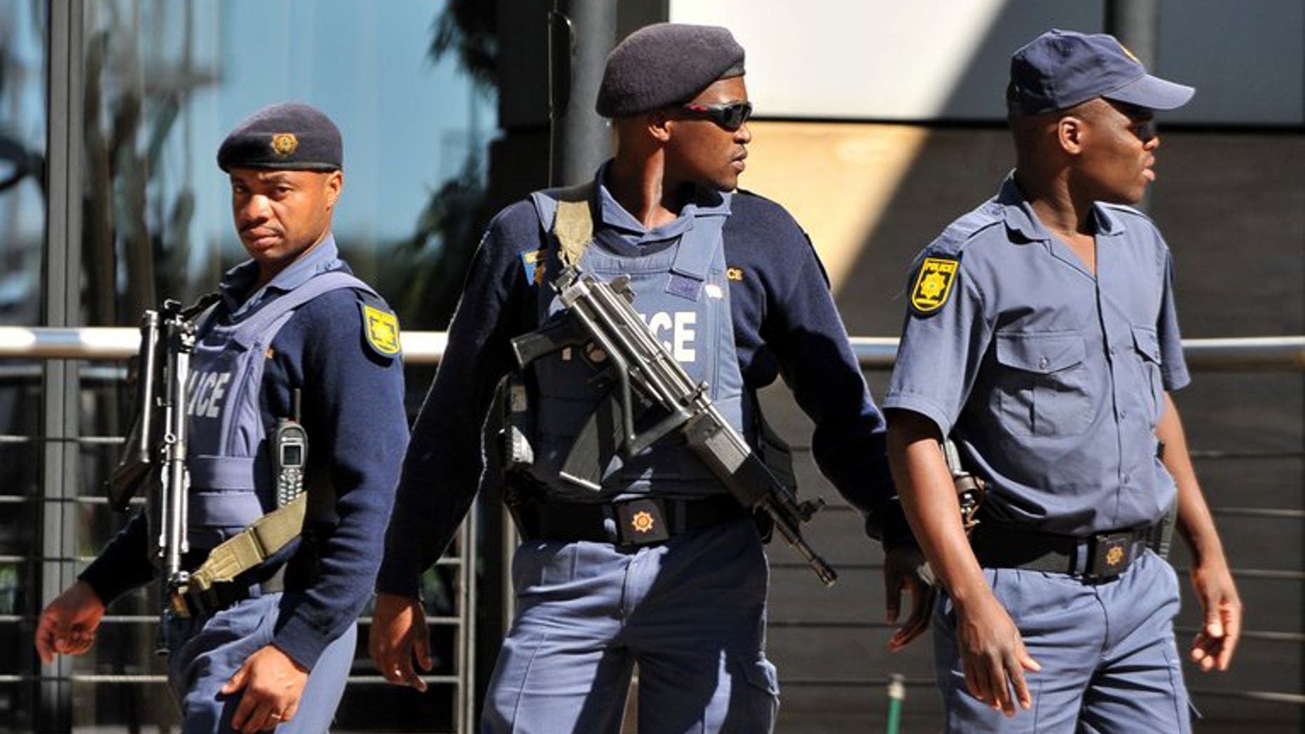 South African police patrol in Johannesburg on May 12, 2010. After years of decreasing crime, South Africa is grappling with a rise in murders, home burglaries and car hijackings, the police minister said.
