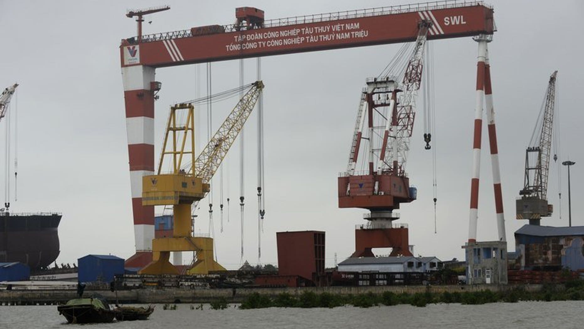 An almost inoperative dock at Vinashin's Nam Trieu shipbuilding factory in the northern coastal city of Hai Phong on February 28, 2013. Vietnam's debt-swamped state-run shipbuilder Vinashin has said it will axe some 14,000 jobs as part of a restructuring that will see it shed 70 percent of its workforce.