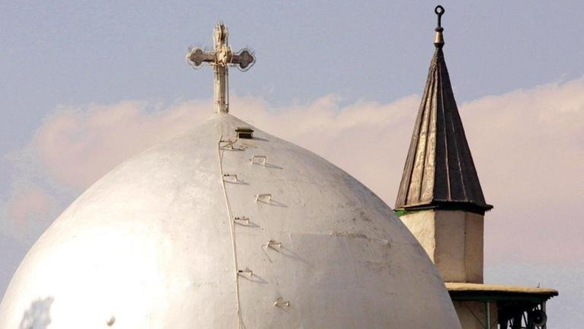 St. Serge Armenian Orthodox church (front) and the Eastern Gate Mosque in Damascus. Christian leaders from Syria and beyond are planning a summit involving Muslim representatives in a drive to use faith to spur peace efforts, the World Council of Churches said Thursday.