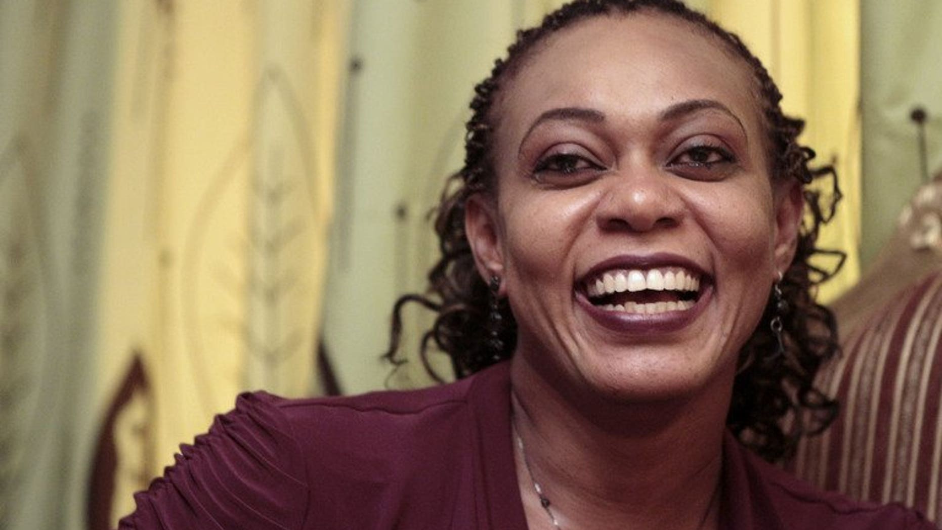 Sudanese Amira Osman Hamed speaks with an AFP journalist during an interview in Khartoum on September 8, 2013.