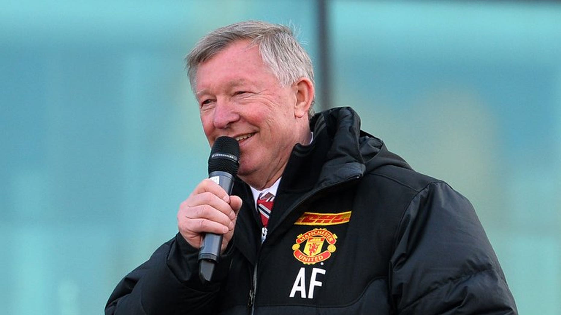 Alex Ferguson addresses crowds outside Old Trafford Stadium in Manchester, on May 13, 2013. Ferguson on Thursday hit back at claims he intentionally influenced officials after ex-referee Mark Halsey revealed his close relationship with the former Manchester United manager.