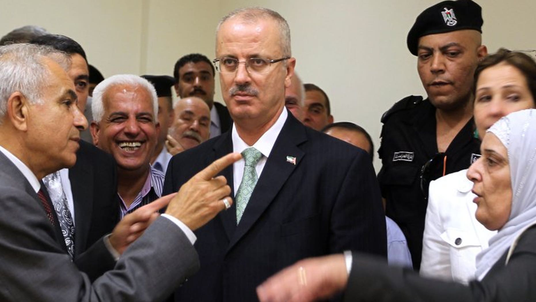 Newly appointed Palestinian prime minister Rami Hamdallah visits the West Bank city of Nablus on June 4, 2013.