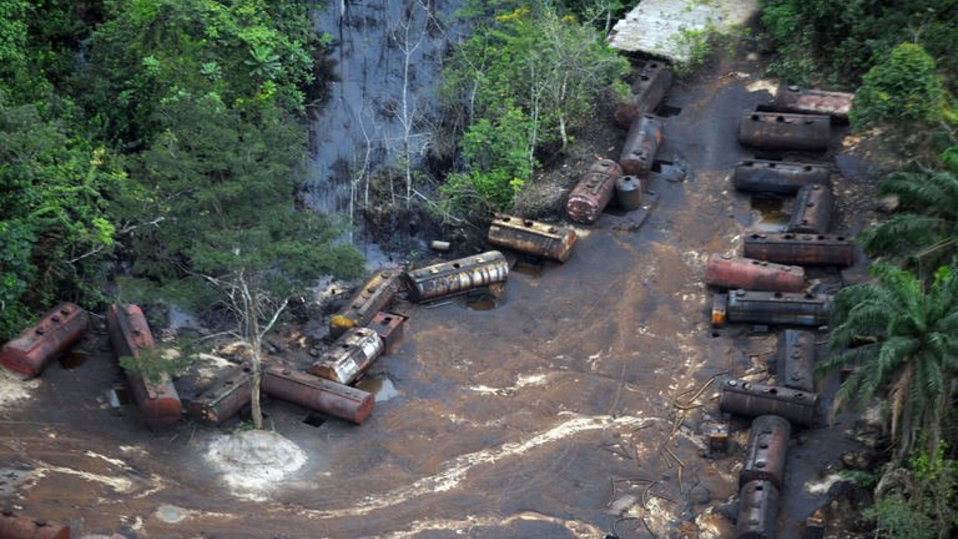 A file picture taken on October 21, 2011 shows Barges laden with stolen oil stationed along the Imo Rivers in the Abia state.