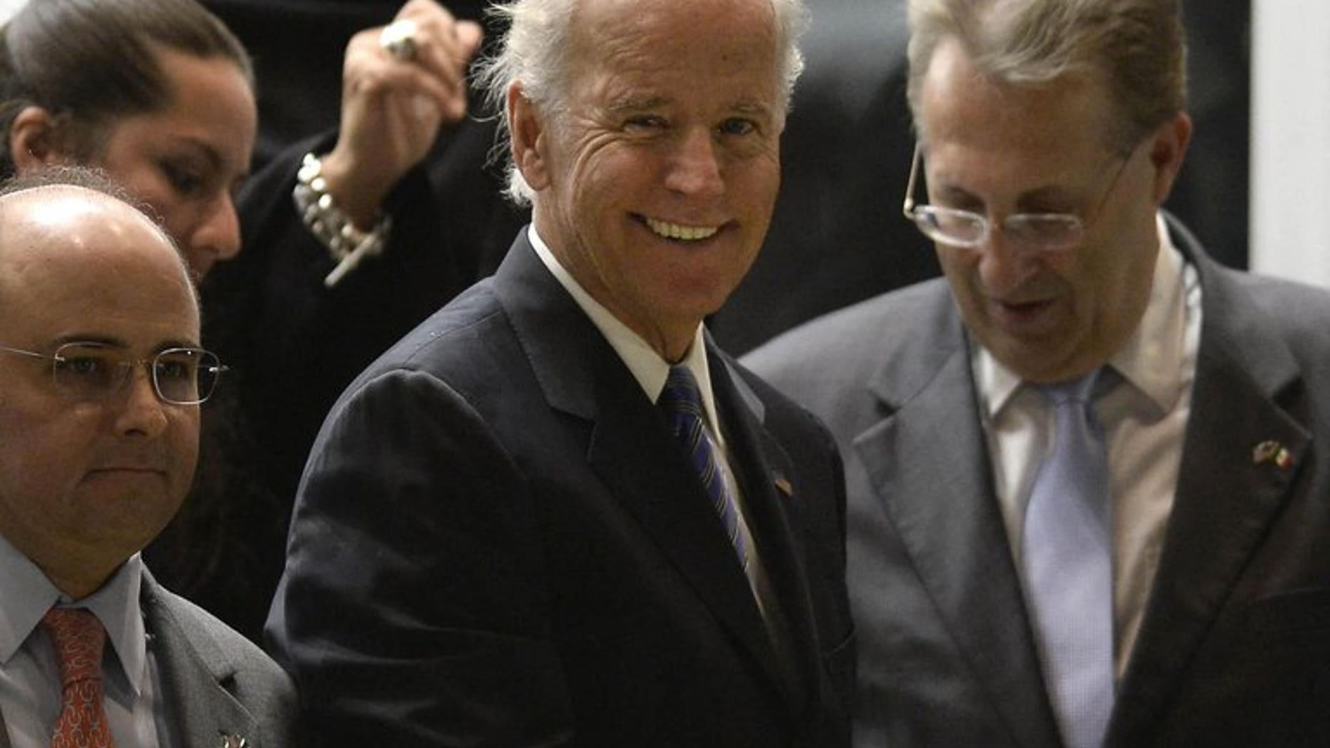 US Vice President Joe Biden (C) arrives at the Benito Juarez international airport in Mexico City, on September 19, 2013 for a one-day official visit.