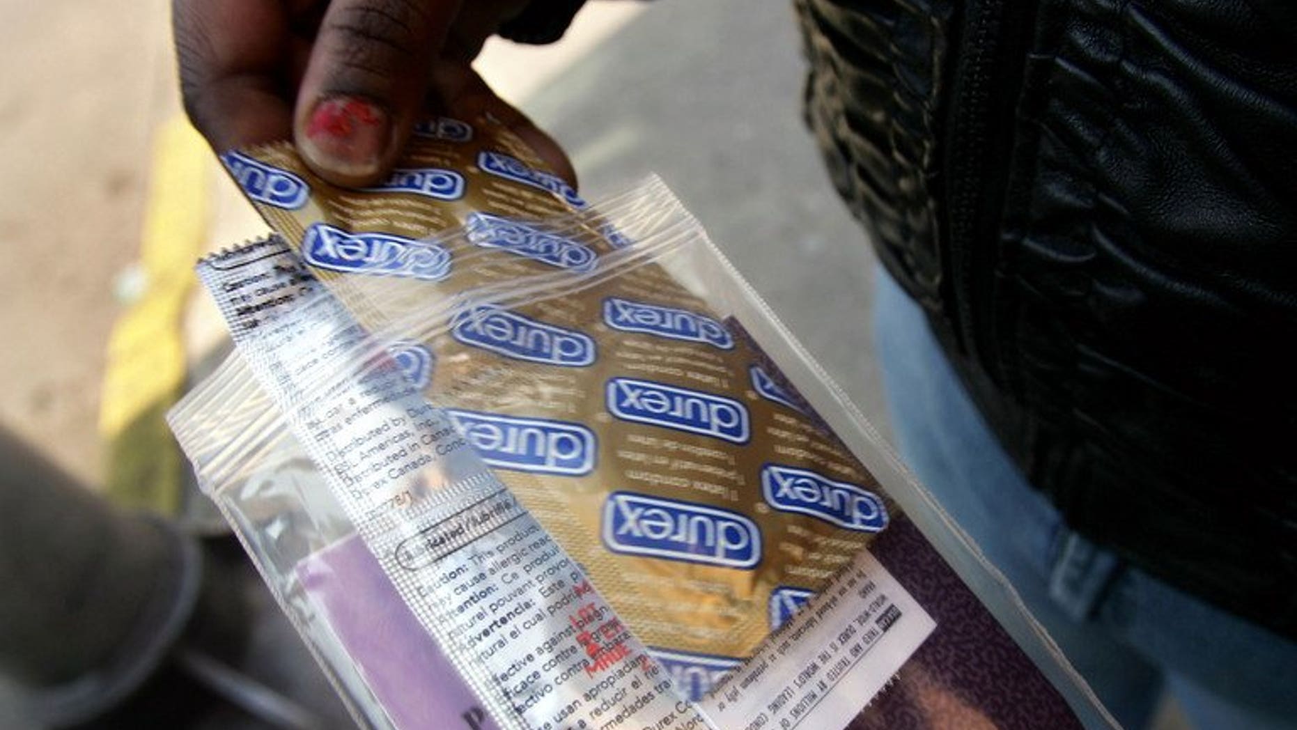 Illustration: the elderly in South Africa are rubbing their arthritis with condoms to ease the pain