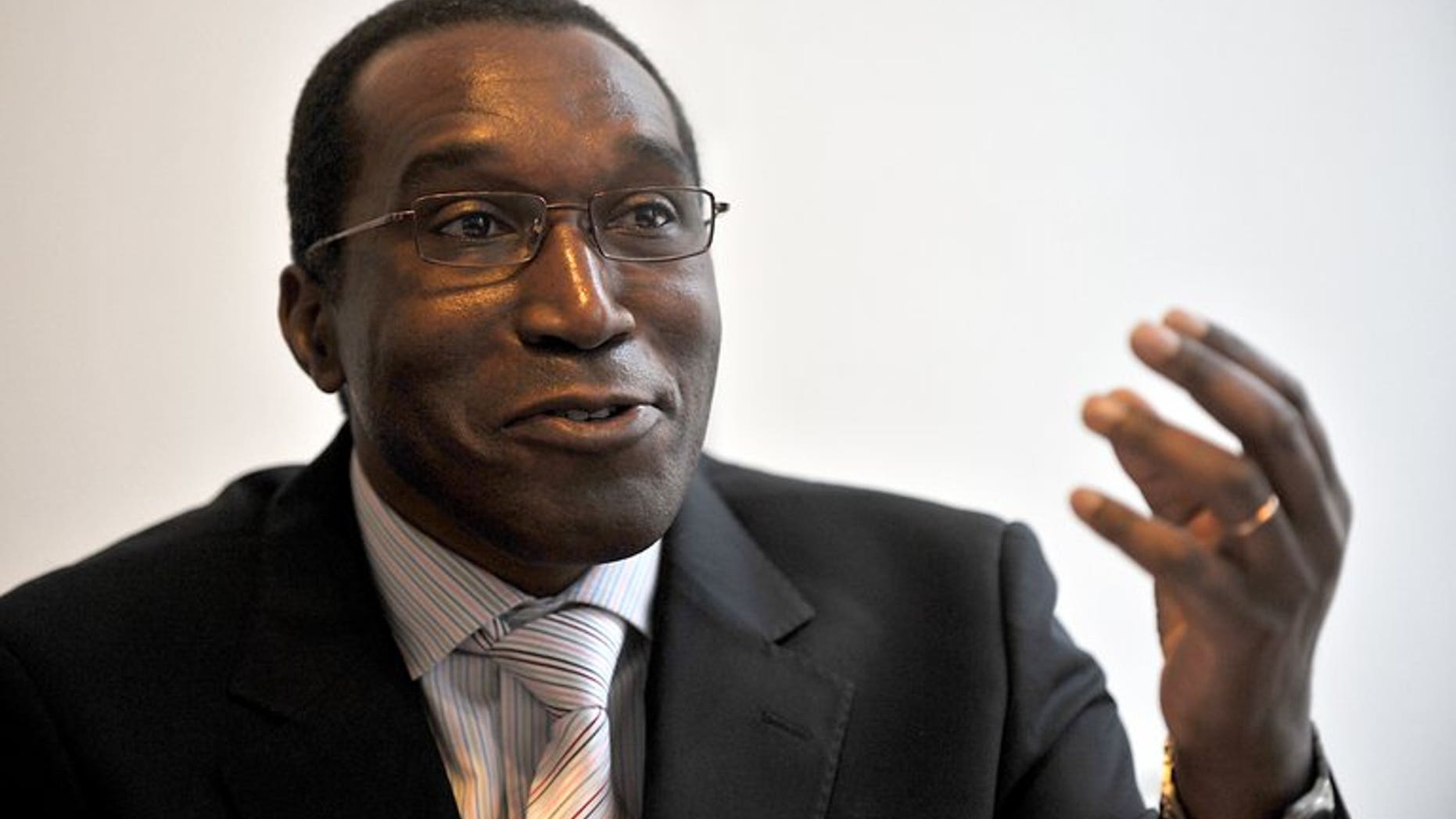 Rwandan doctor Eugene Rwamucyo gives an interview in Lille on October 24, 2009. French judges have charged Rwamucyo for planning to "commit the crime of genocide" in 1994, a judicial source said, after Kigali issued an international warrant against him.