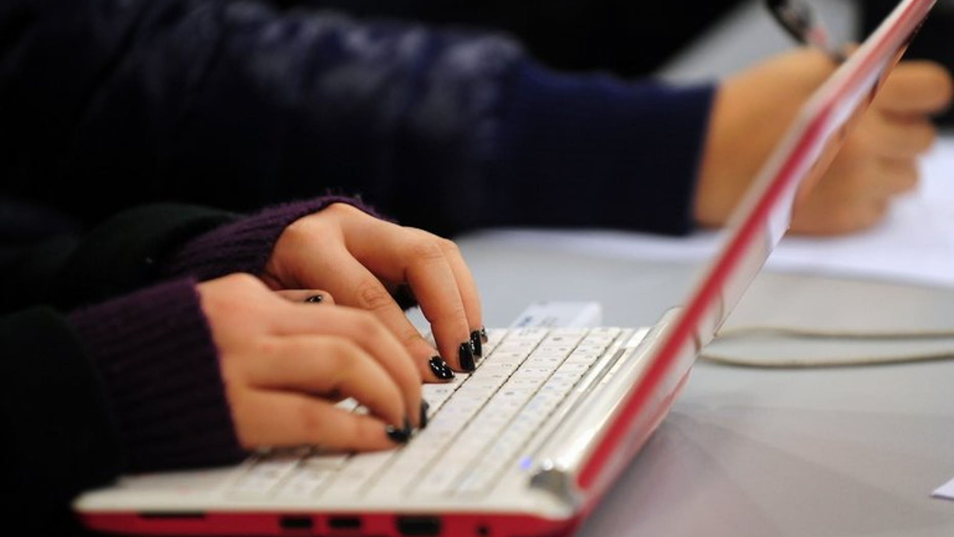 Illustration photo. Children as young as eight are being blackmailed into performing sex acts live on webcams, causing some of them to self-harm or even commit suicide, a British watchdog has warned.