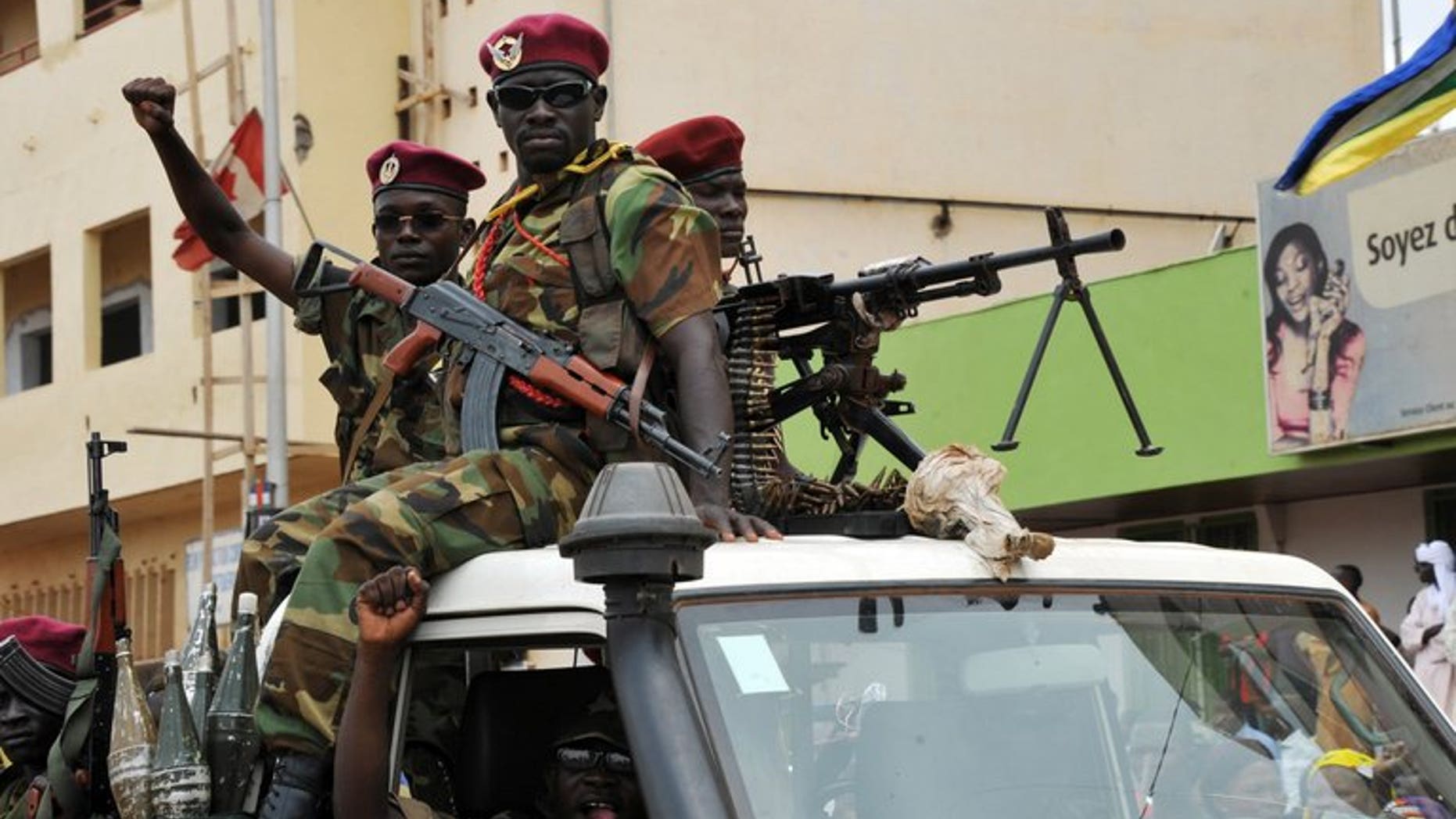 Seleka rebels patrol on a pickup truck in Bangui on March 30, 2013. The African Union on Friday urged the international community to do more in the poor and strife-torn Central African Republic, describing the situation there as "dire".