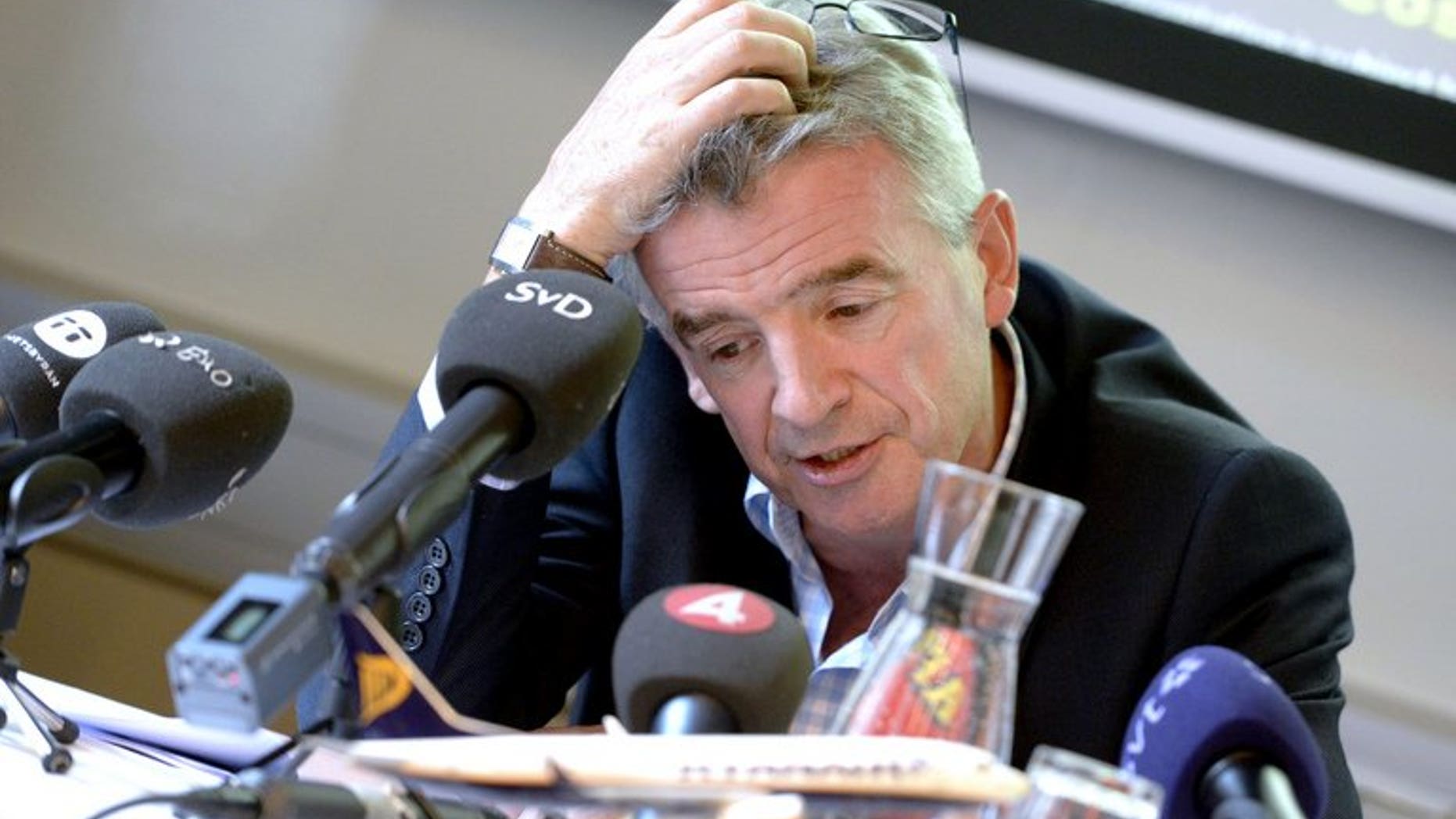 Ryanair chief executive Michael O'Leary is pictured in Stockholm, Sweden on August 29, 2013. Ryanair has apologised to a distraught father who was charged 188 euro (??158) by the budget airline to change his flight from Ireland to England when his wife and three children were killed in a fire.