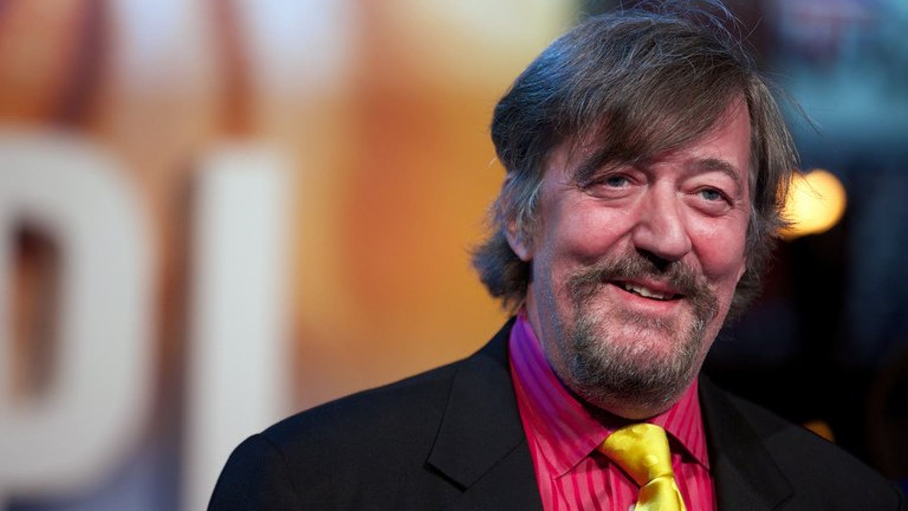 Stephen Fry seen in central London on December 3, 2012. One of the joys of having six million followers on Twitter is never having to talk to journalists, Fry said in a foul-mouthed rant against a hack who questioned whether he wrote his own Tweets.