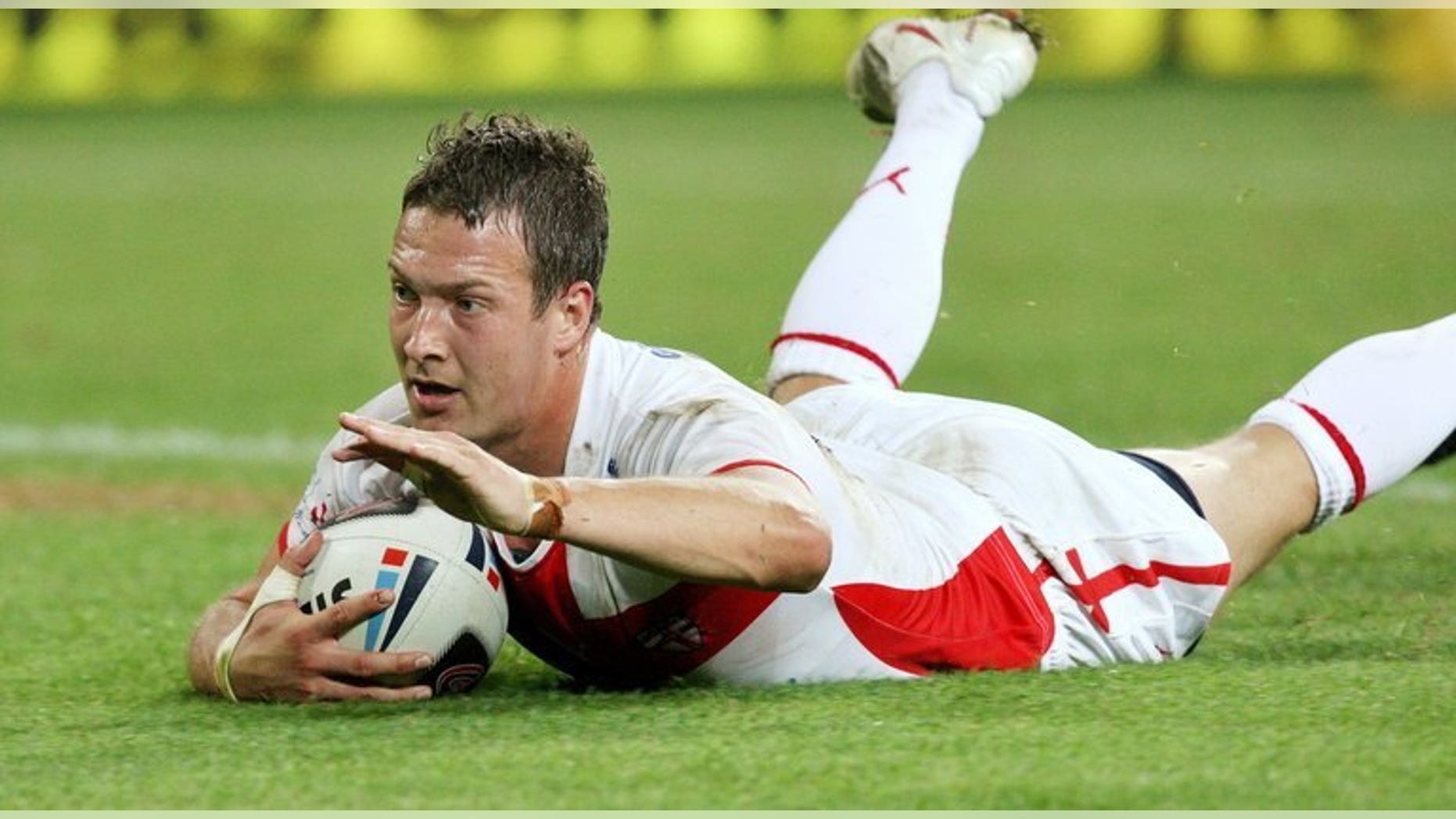 England's Danny McGuire, in action on November 15, 2008, scored a late drop-goal to put defending Super League champions Leeds into the play-off semi-finals as they sealed an 11-10 win over familiar foes St Helens at Headingley