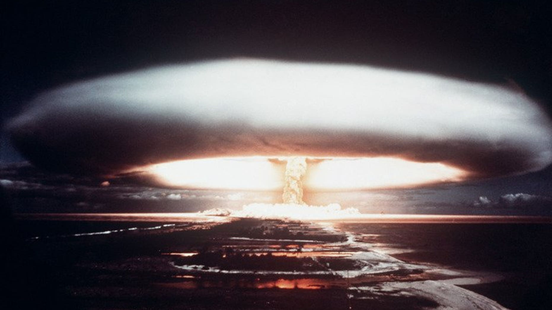 Picture taken in 1971, showing a nuclear explosion in Mururoa atoll. The US Air Force came dramatically close to detonating a huge atomic bomb over North Carolina in 1961, according to a newly declassified document published by Britain's Guardian newspaper on Saturday.