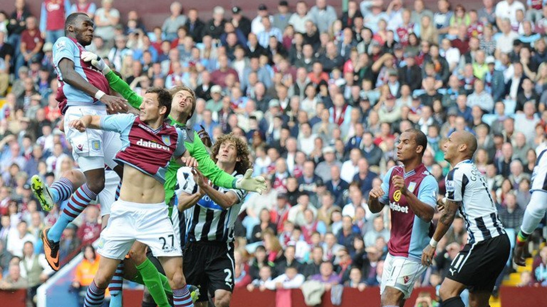 Aston Villa's Belgian striker Christian Benteke (left) at Villa Park in Birmingham, West Midlands, England, on September 14, 2013. Villa manager Paul Lambert played down the gravity of an injury that forced key striker Christian Benteke off during his side's 1-0 win at Norwich City on Saturday.