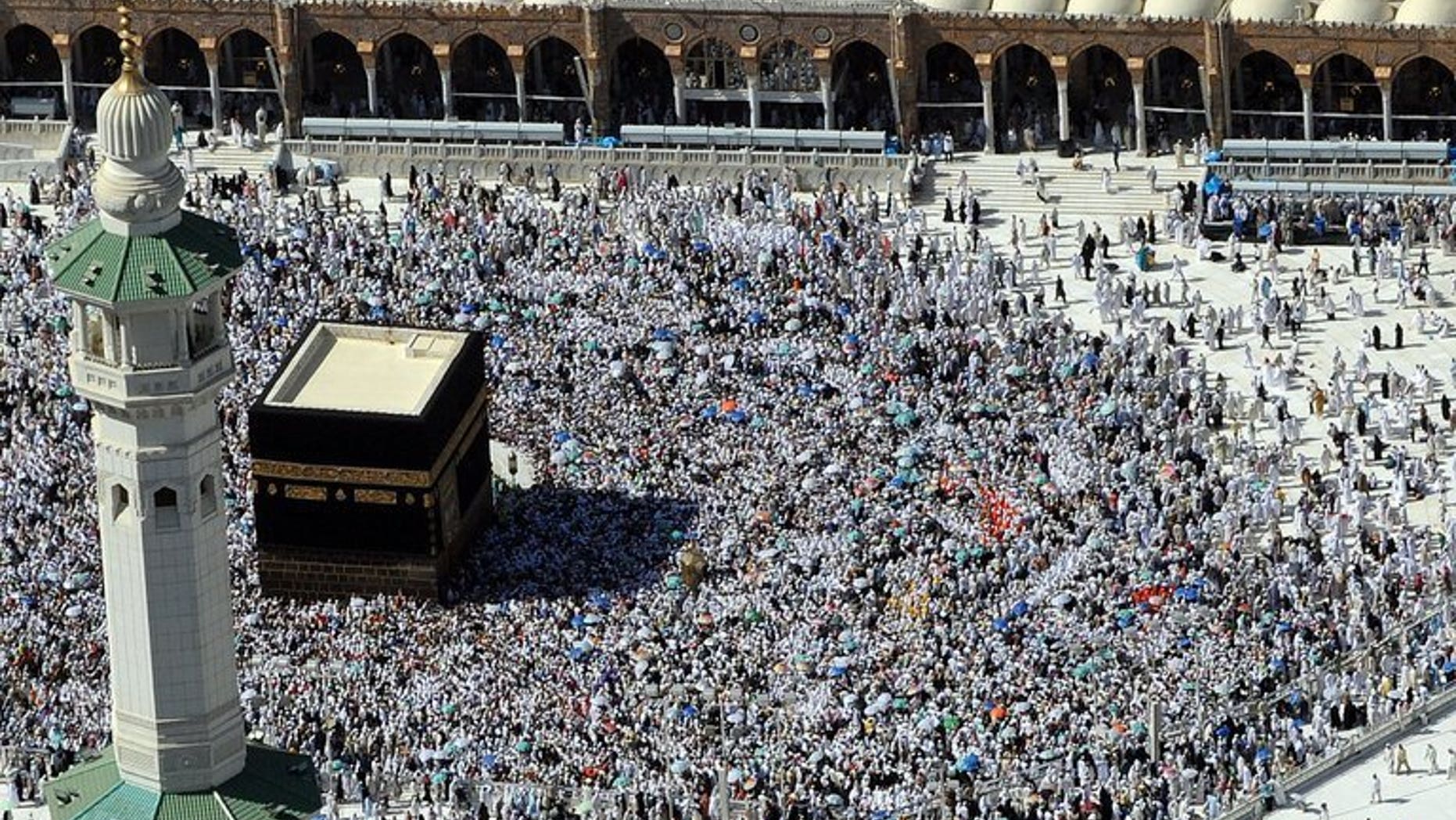 Muslim pilgrims walk around the Kaaba at the Grand Mosque during the annual Hajj pilgrimage in Mecca, on November 7, 2011.