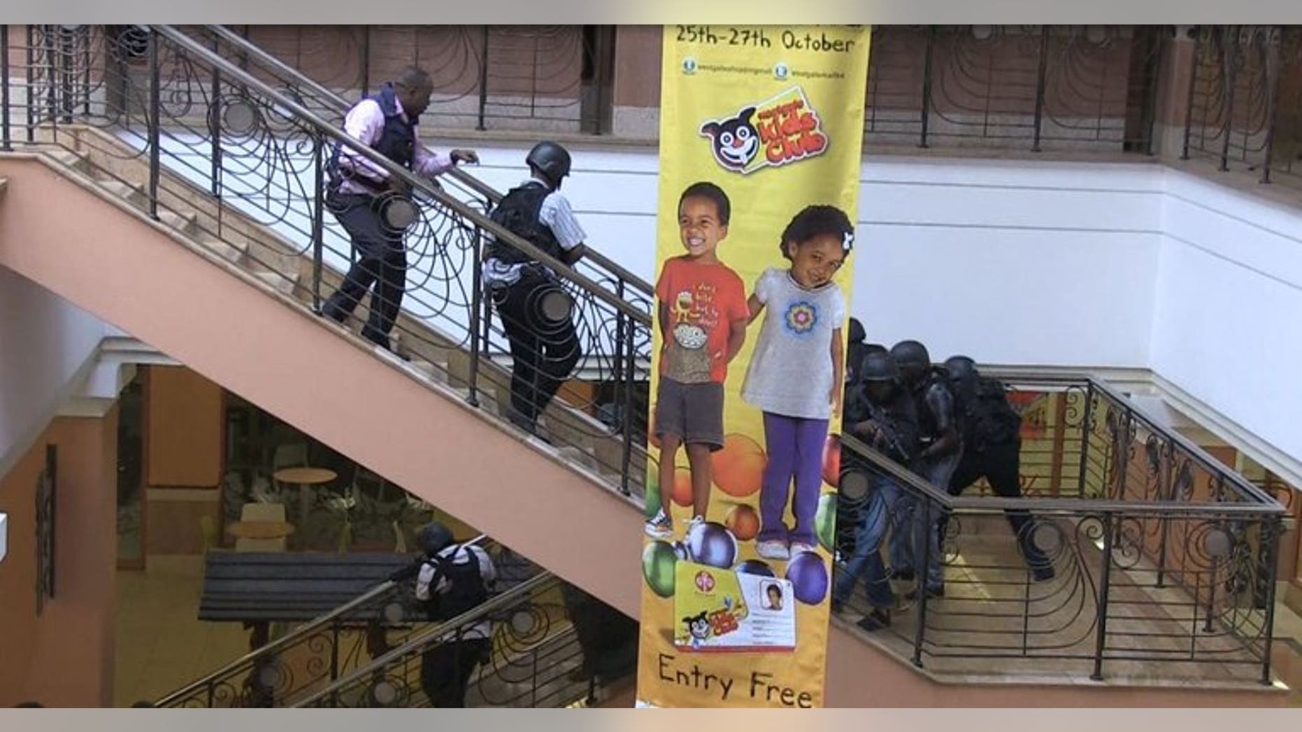 An image grab taken from AFP TV shows Kenyan troops taking position on September 21, 2013 inside the Westgate mall in Nairobi. Three Britons have been confirmed dead in an attack on a Nairobi shopping mall by Somali Islamist militants and the British toll is likely to rise, the Foreign Office in London said Sunday.