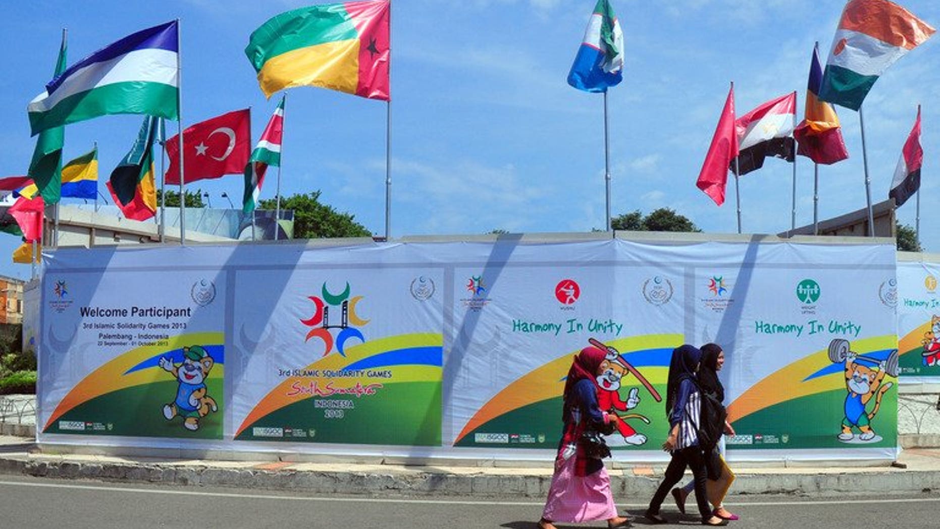 The flags of countries participating in the Islamic Solidarity Games decorate a venue at the Palembang sports complex in Palembang on Indonesia's Sumatra island on September 20, 2013. The games got under way in Indonesia on Sunday despite a chaotic run-up to the event and debates over appropriate outfits for Muslim athletes.