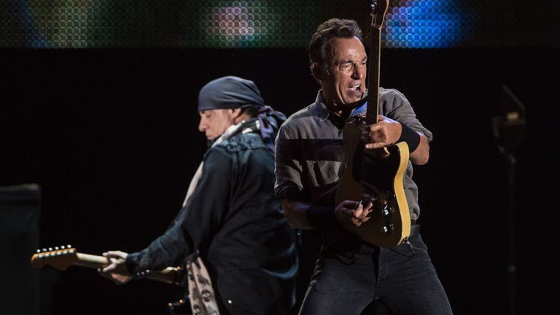 American Bruce Springsteen (R) performs during the Rock in Rio music festival in Rio de Janeiro, Brazil, on September 22, 2013.
