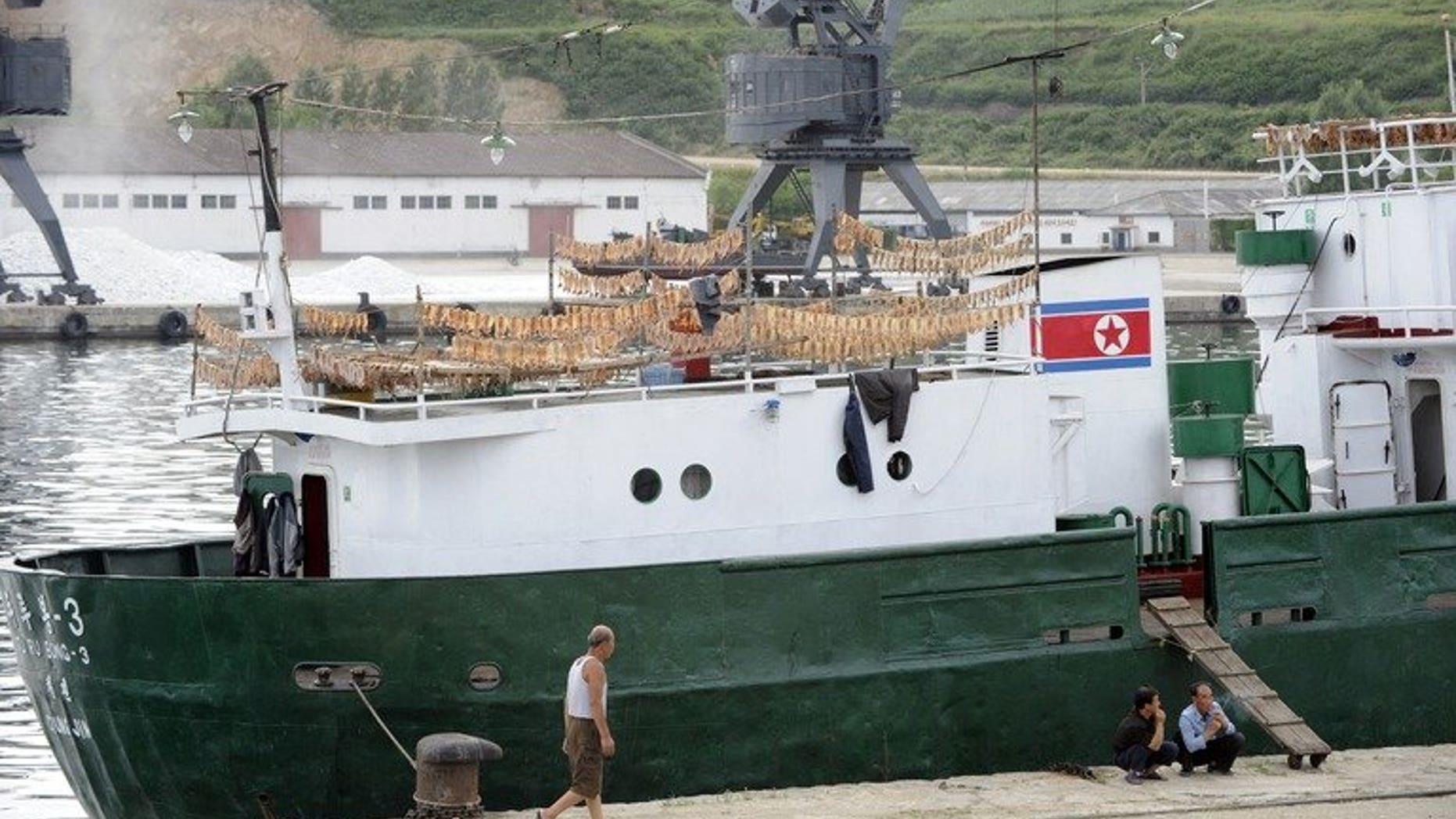 North Korean fisherman unload at the port city of Rajin, where a railway to Russia begins, on September 2, 2011.
