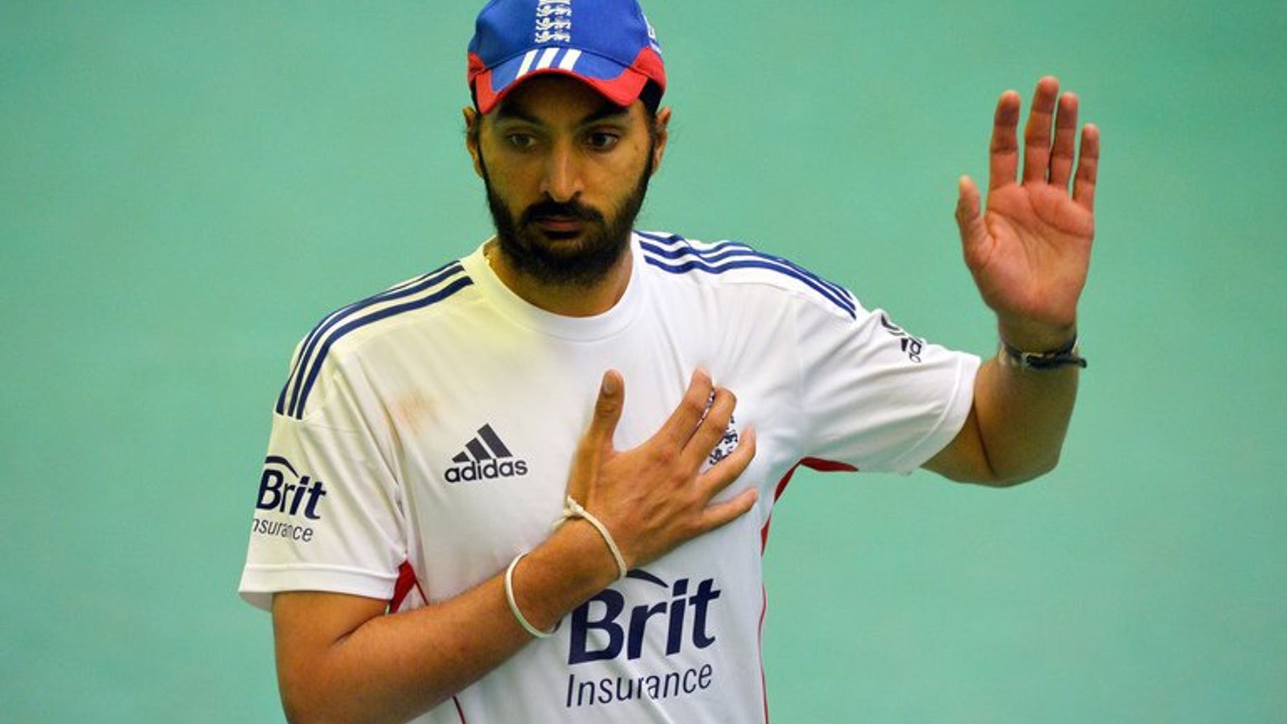 England cricketer Monty Panesar takes part in a training session at Old Trafford in Manchester on July 31, 2013. Panesar was given a chance to revive his England career after being named in a 17-man squad for the forthcoming Ashes tour of Australia.