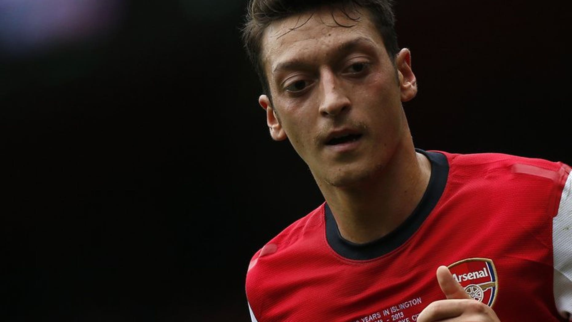 Arsenal's German midfielder Mesut Ozil plays at the Emirates stadium in north London on September 22, 2013.