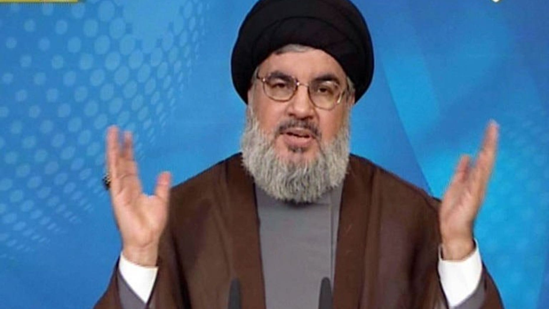 An image grab from Hezbollah's al-Manar TV shows Hassan Nasrallah, head of Hezbollah, on September 23, 2013 in Lebanon.