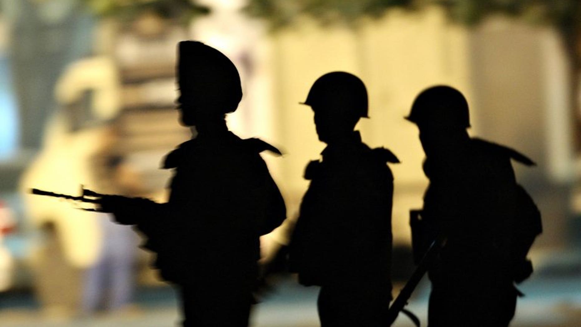 In this photograph taken on November 28, 2008, Indian Army soldiers take their positions outside the Taj Mahal Hotel in Mumbai. The chilling siege in Nairobi has resonated deeply in the Indian megacity, where militants staged a three-day rampage five years ago in attacks on a range of targets including luxury hotels.