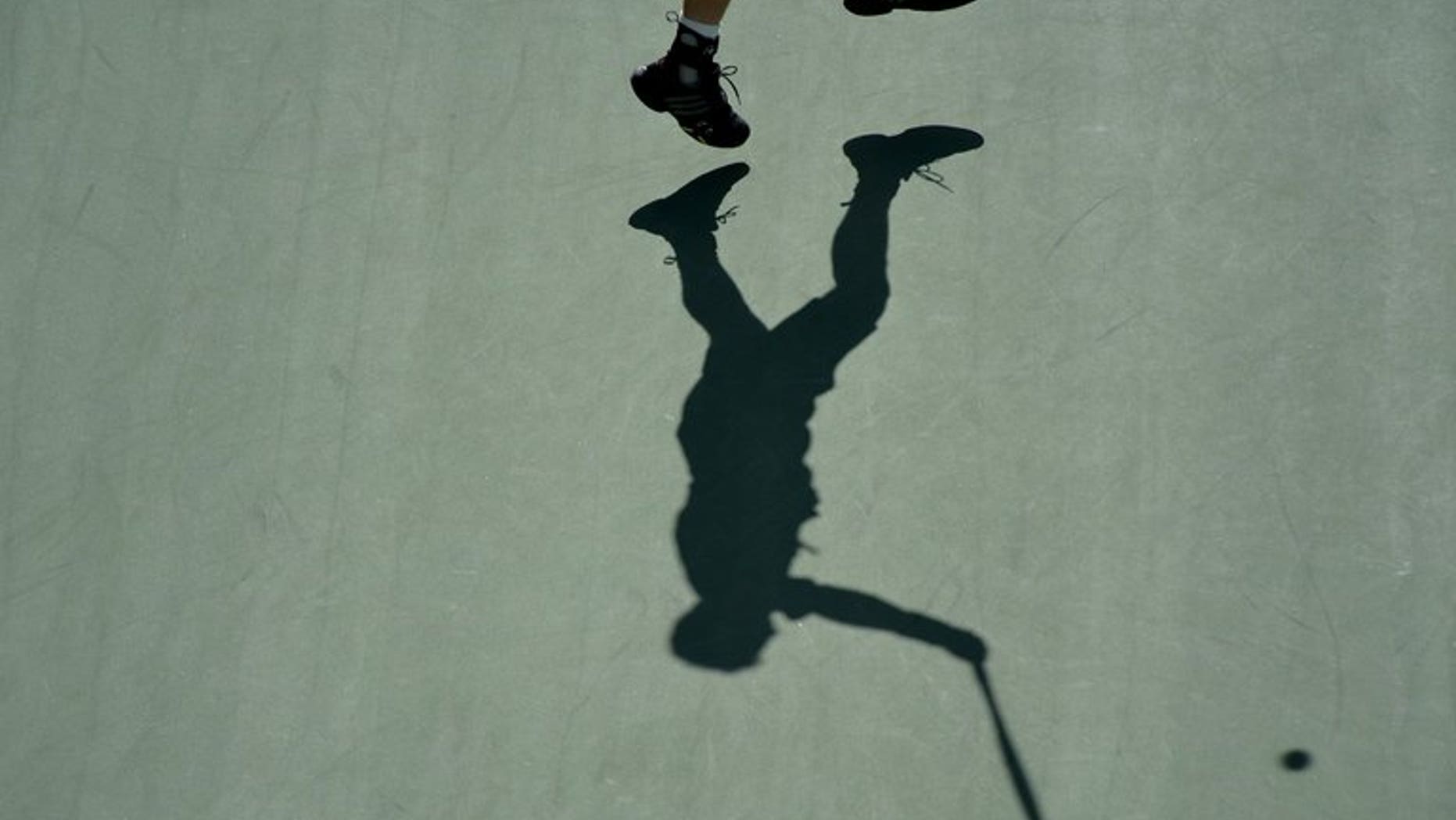 Andy Murray of Britain returns a shot to Stanislas Wawrinka of Switzerland during their 2013 US Open men's singles quarter final in New York on September 5, 2013. Canadian Michael Downey was named as the new chief executive of Britain's under-fire Lawn Tennis Association on Tuesday.