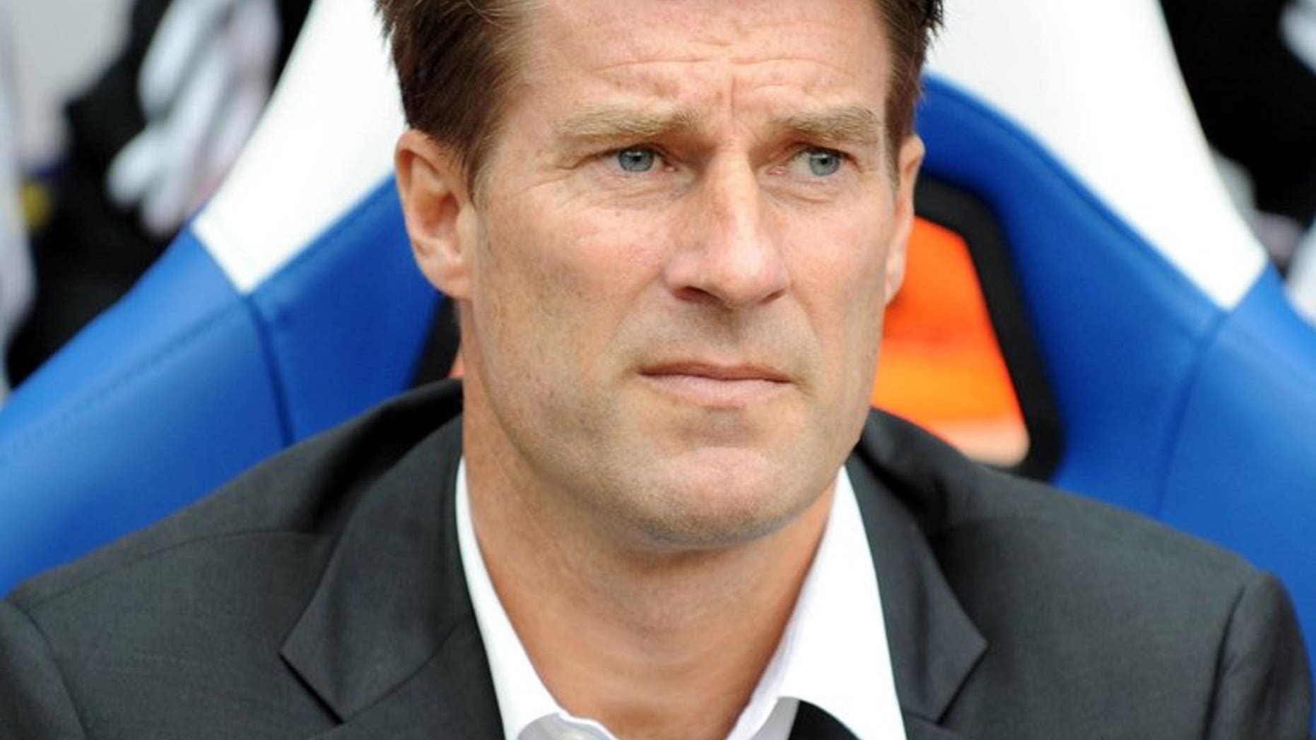 Swansea City's Danish manager Michael Laudrup watches during the English Premier League football match between Crystal Palace and Swansea City at Selhurst Park in south London on September 22, 2013.