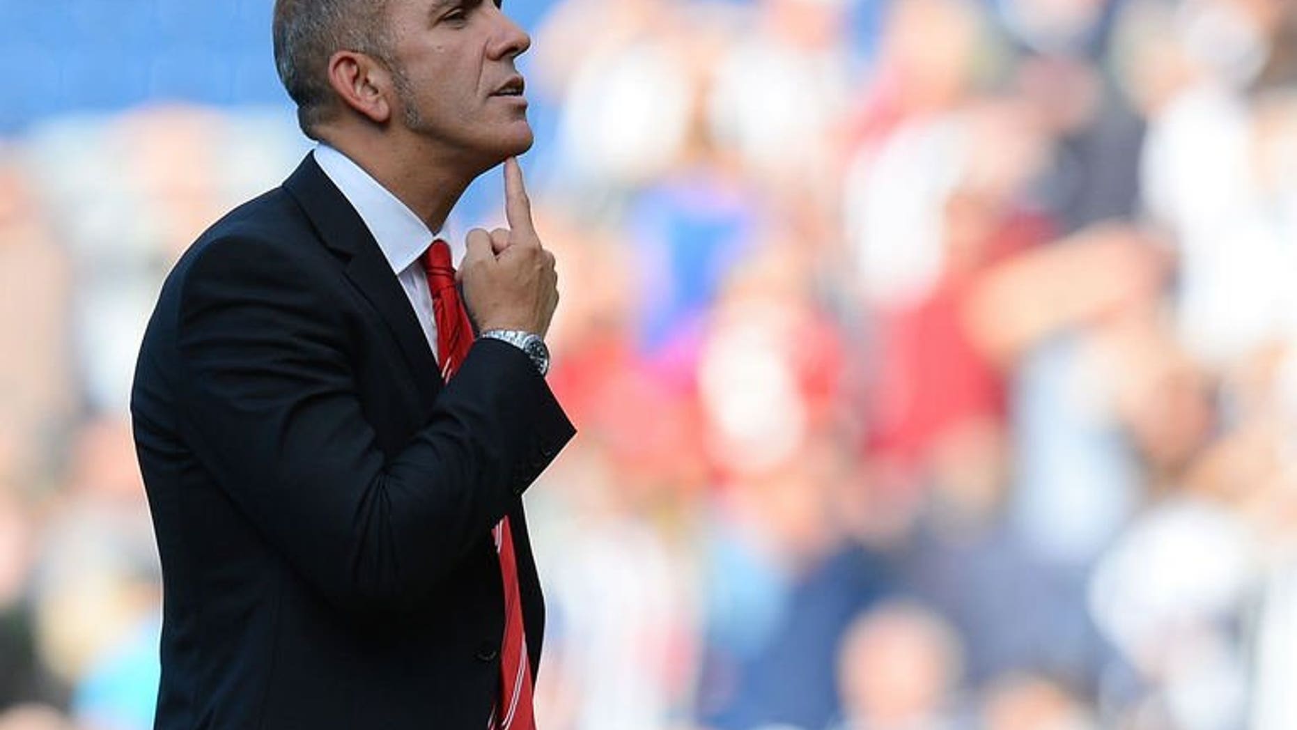 Sunderland manager Paolo Di Canio reacts towards the Sunderland fans at The Hawthorns in West Bromwich, central England, on September 21, 2013.