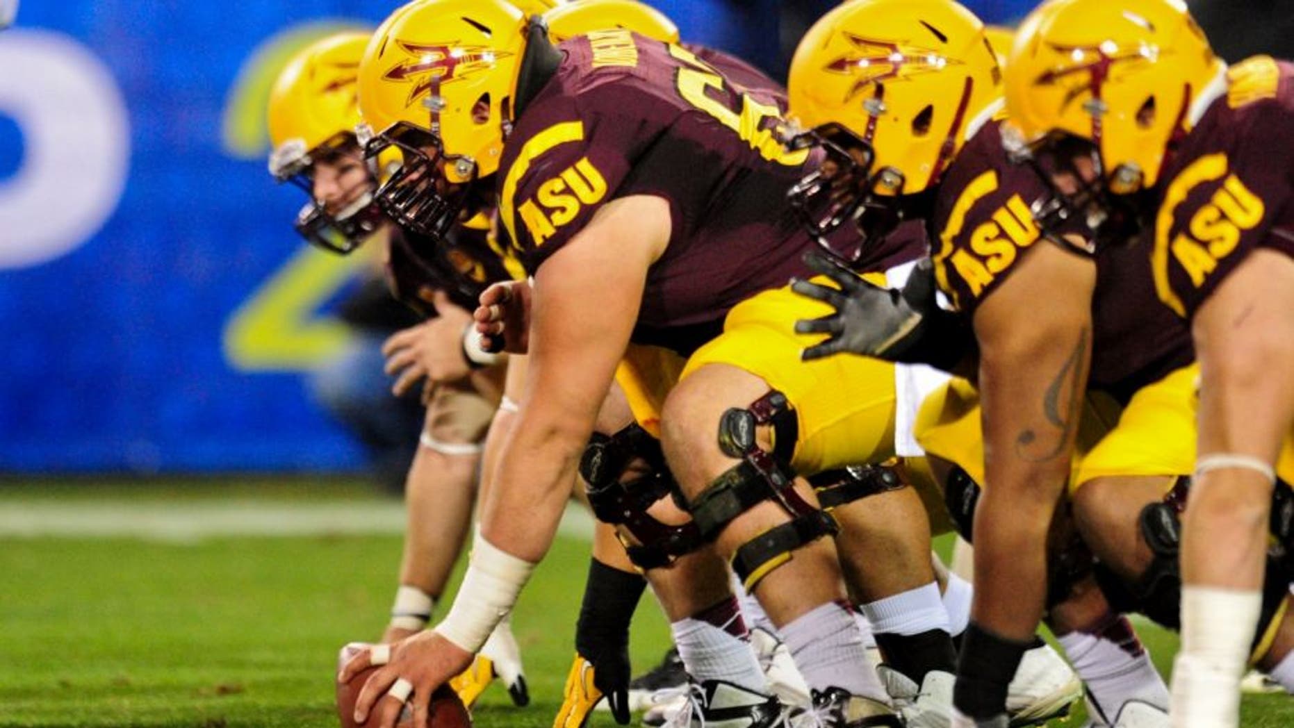 Dec 7, 2013; Tempe, AZ, USA; The Arizona State Sun Devils offensive line squares off against the Stanford Cardinal defense during the first half at Sun Devil Stadium. Mandatory Credit: Matt Kartozian-USA TODAY Sports