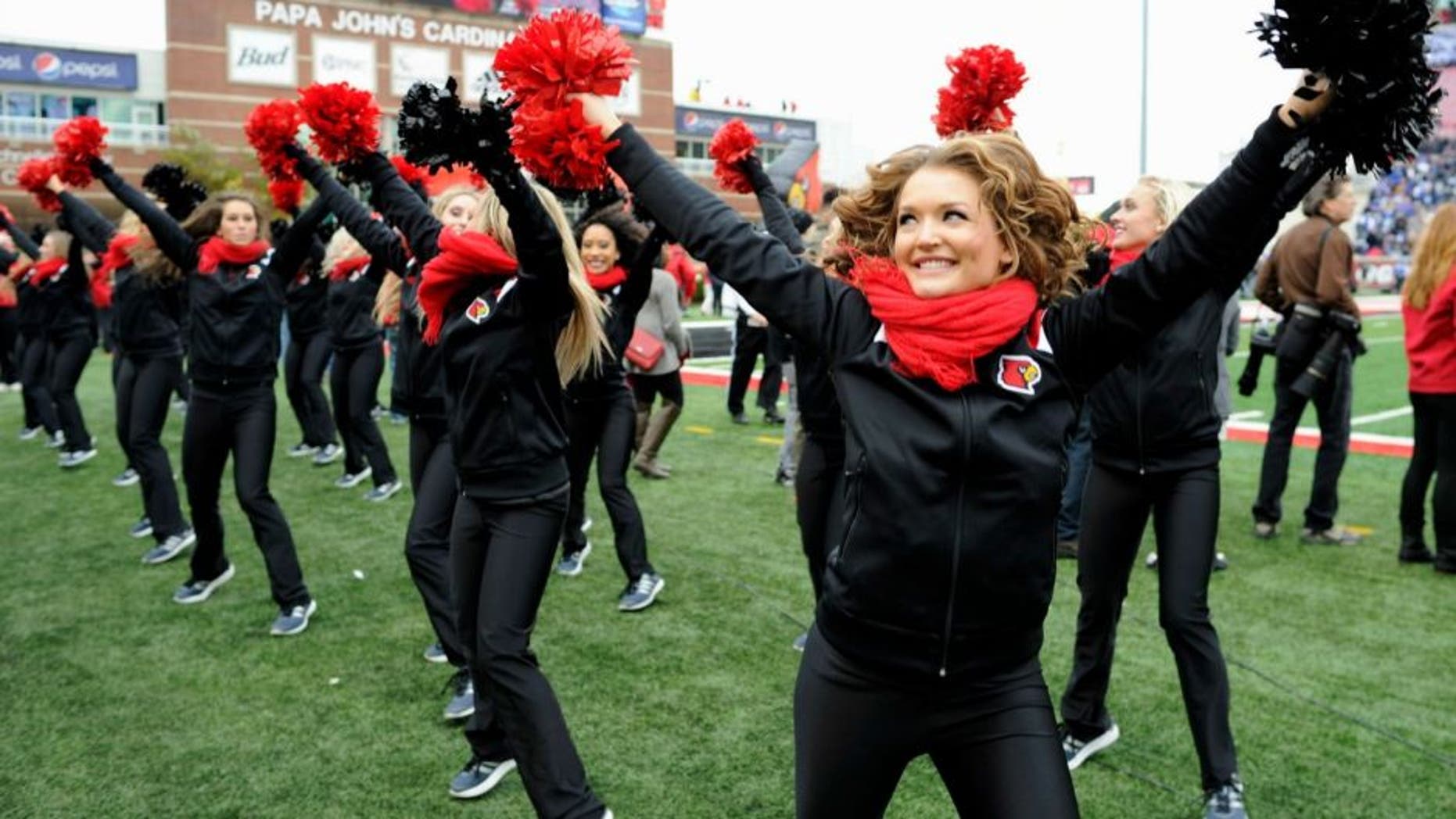 Nov 29, 2014; Louisville, KY, USA; The Louisville Cardinals cheerleaders perform during the second quarter against the Kentucky Wildcats at Papa John's Cardinal Stadium. Mandatory Credit: Jamie Rhodes-USA TODAY Sports