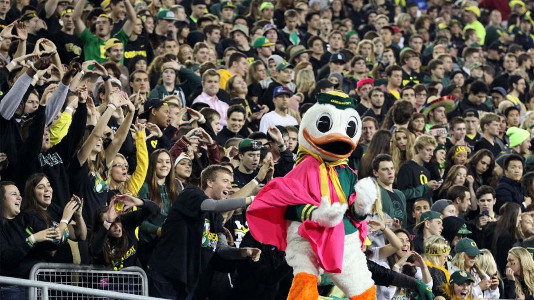 Oct 19, 2013; Eugene, OR, USA; Oregon Ducks mascot performs for the fans in the third quarter against the Washington State Cougars at Autzen Stadium. Mandatory Credit: Scott Olmos-USA TODAY Sports