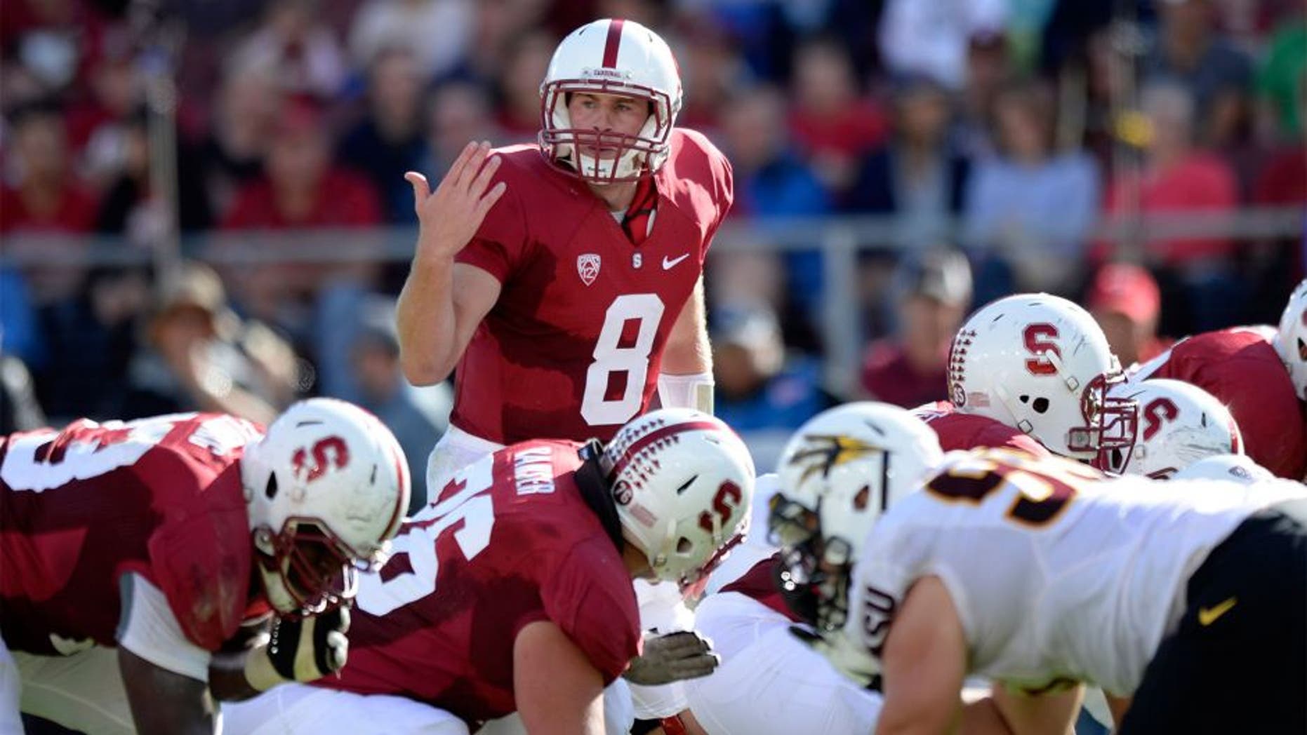 Sep 21, 2013; Stanford, CA, USA; Stanford Cardinal quarterback Kevin Hogan (8) changes a play at the line during the first quarter against the Arizona State Sun Devils at Stanford Stadium. Mandatory Credit: Bob Stanton-USA TODAY Sports