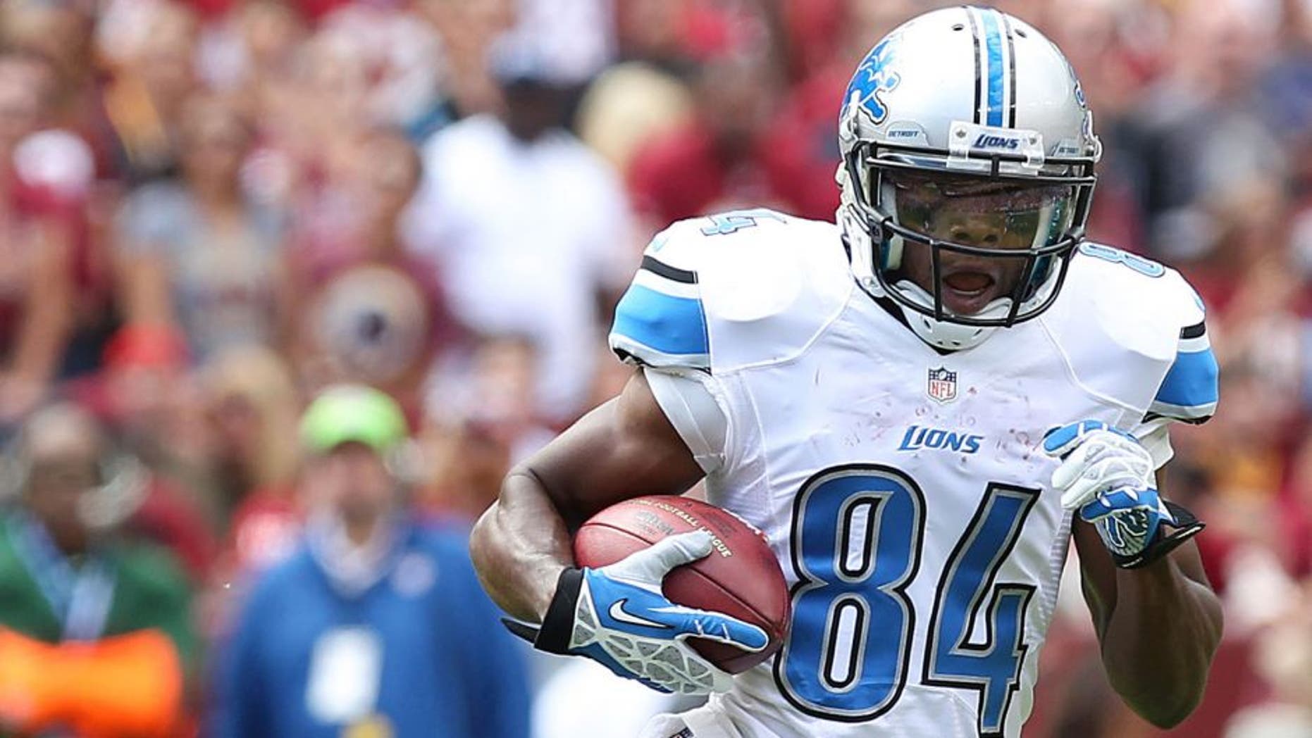 Sep 22, 2013; Landover, MD, USA; Detroit Lions wide receiver Ryan Broyles (84) runs with the ball against the Washington Redskins at FedEx Field. Mandatory Credit: Geoff Burke-USA TODAY Sports
