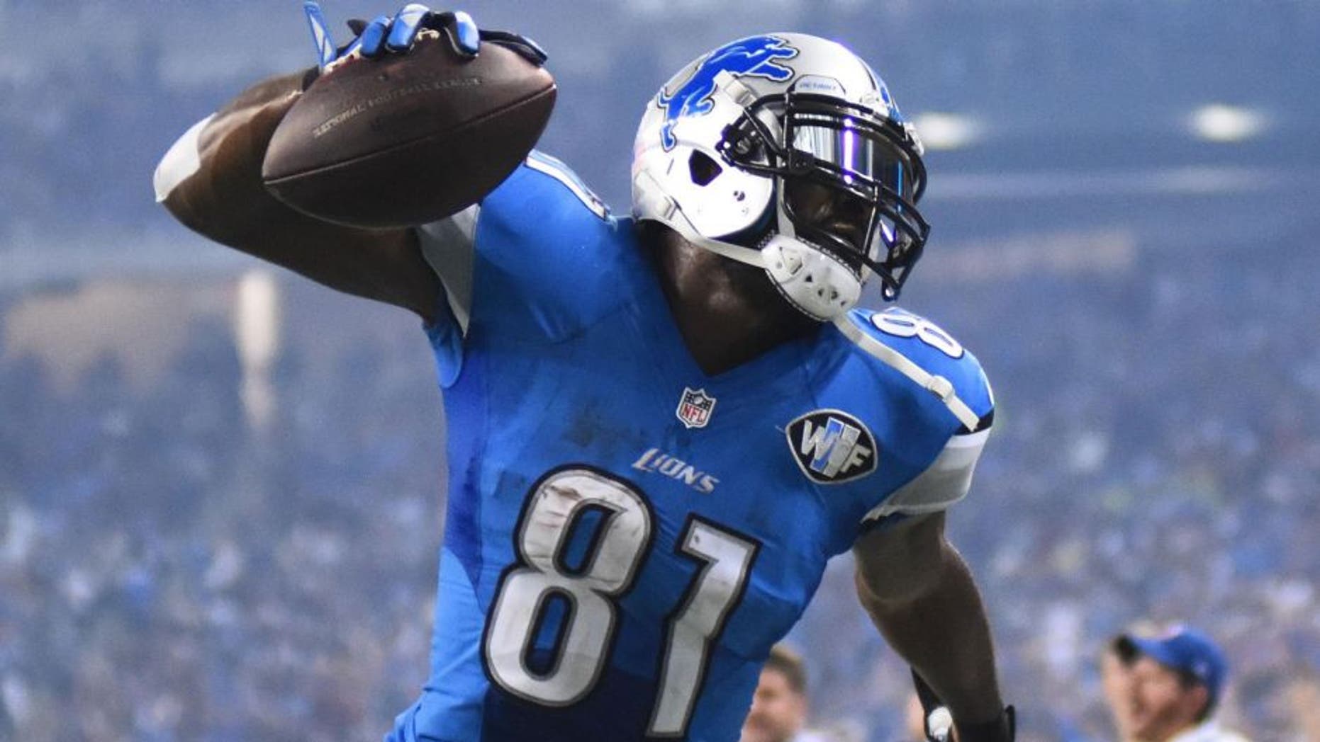 Nov 26, 2015; Detroit, MI, USA; Detroit Lions wide receiver Calvin Johnson (81) celebrates his touchdown against the Philadelphia Eagles during the third quarter of a NFL game on Thanksgiving at Ford Field. Mandatory Credit: Tim Fuller-USA TODAY Sports