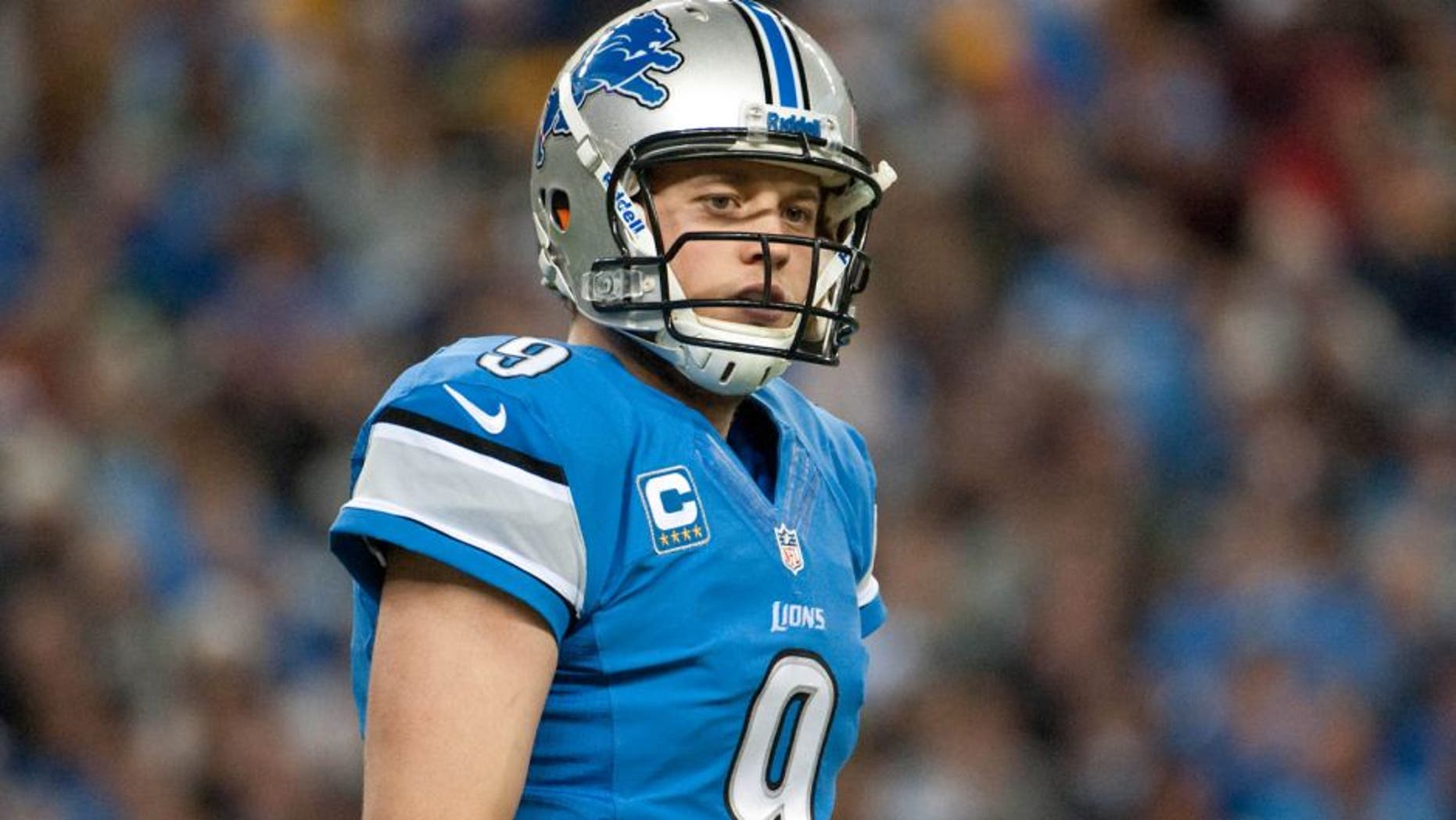 Nov 28, 2013; Detroit, MI, USA; Detroit Lions quarterback Matthew Stafford (9) during the game against the Green Bay Packers during a NFL football game on Thanksgiving at Ford Field. Mandatory Credit: Tim Fuller-USA TODAY Sports