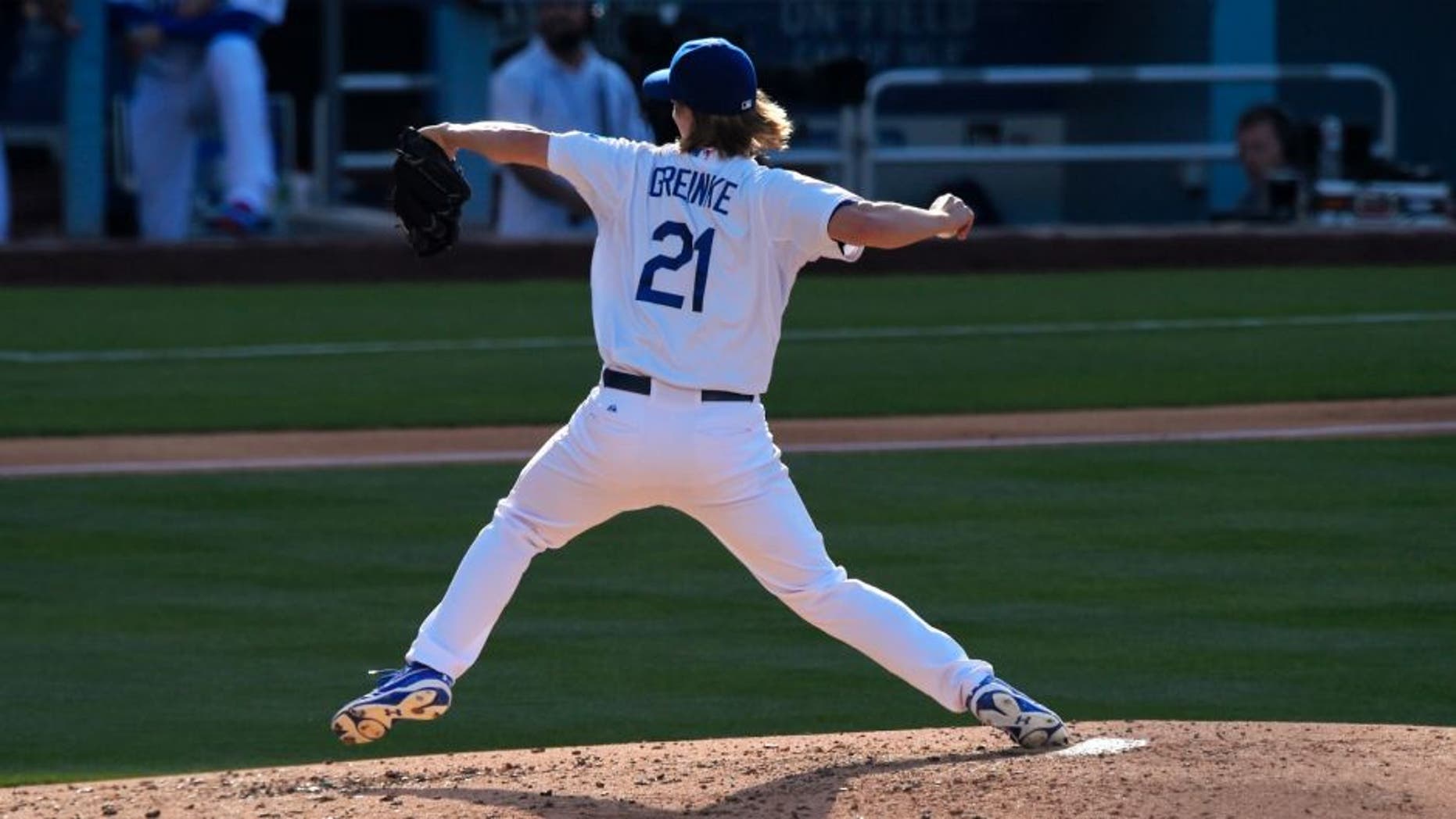 Los Angeles Dodgers starting pitcher Zack Greinke throws to the plate during the third inning of a baseball game against the St. Louis Cardinals, Sunday, June 7, 2015, in Los Angeles. (AP Photo/Mark J. Terrill)