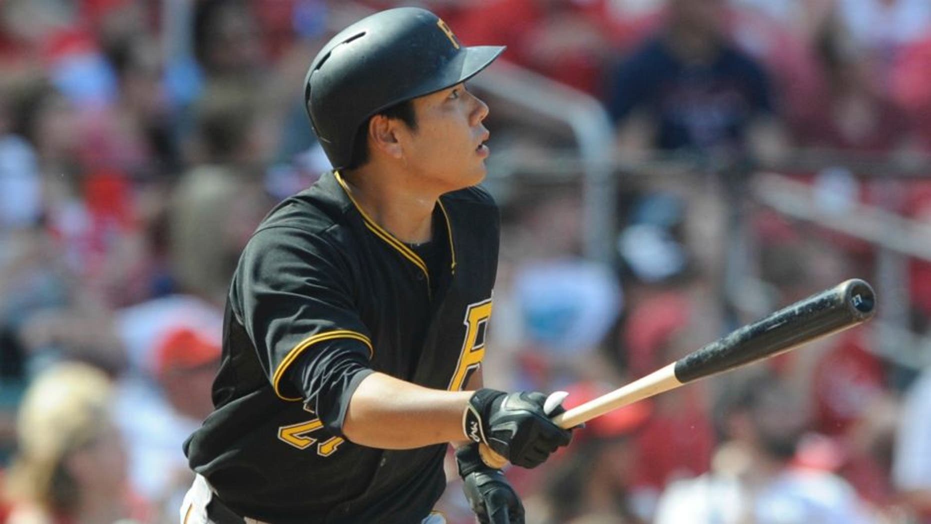 Pittsburgh Pirates' Jung Ho Kang, of South Korea, watches his solo home run against the St. Louis Cardinals in the ninth inning in a baseball game, Sunday, May 3, 2015, at Busch Stadium in St. Louis. (AP Photo/Bill Boyce)