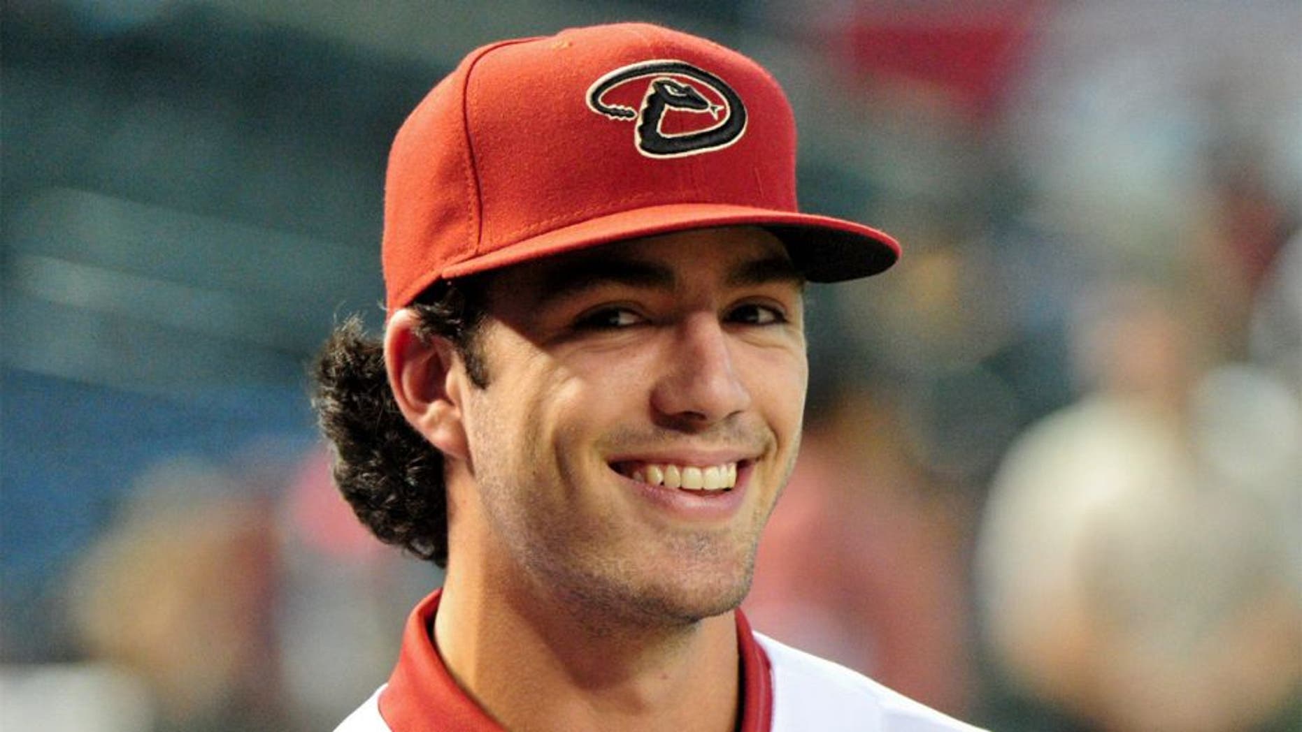 Jul 20, 2015; Phoenix, AZ, USA; First overall pick in the 2015 MLB draft Dansby Swanson looks on after signing with the Arizona Diamondbacks at Chase Field. Mandatory Credit: Matt Kartozian-USA TODAY Sports